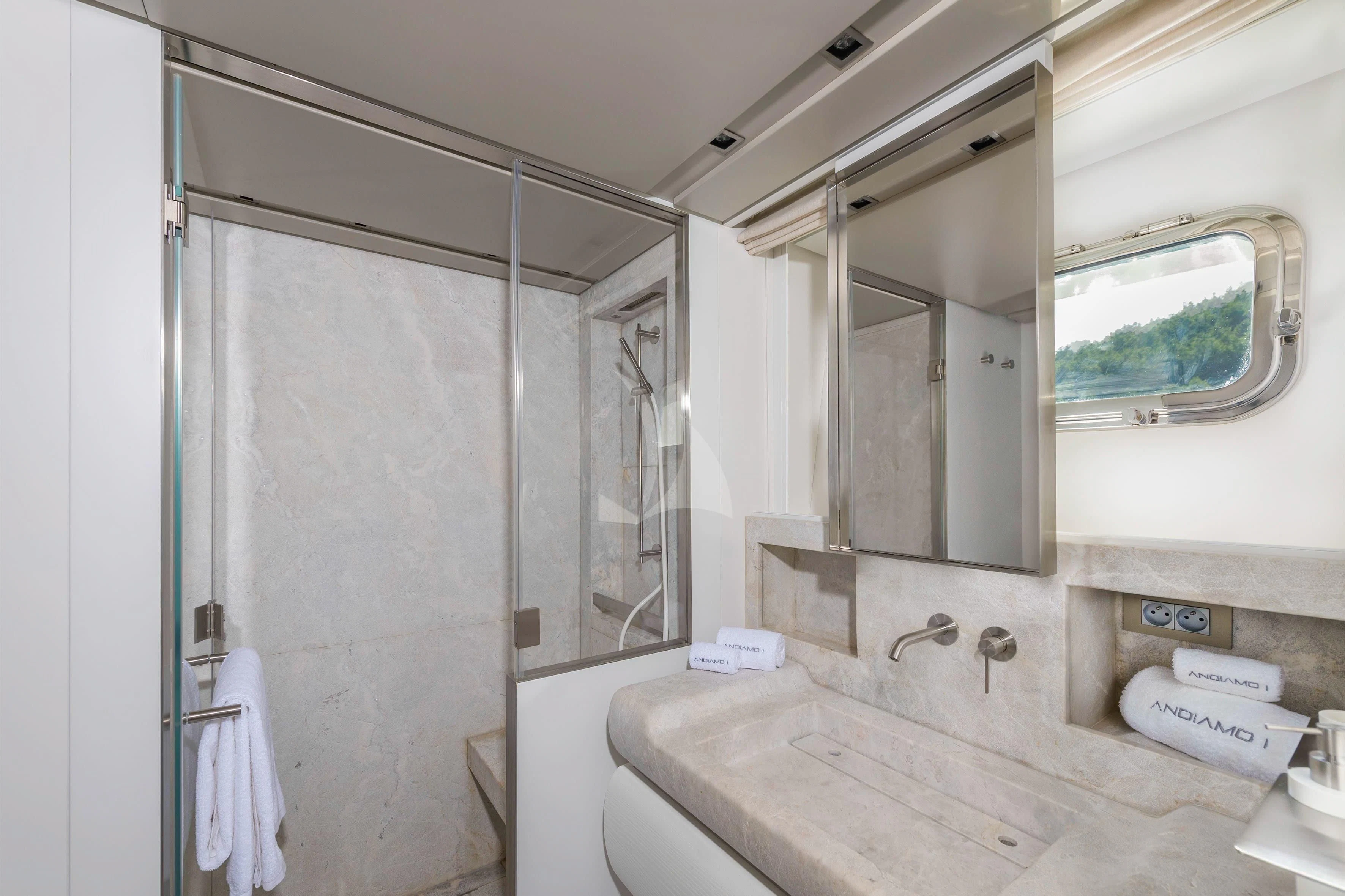 a bathroom with a sink and a mirror aboard PARALOS Yacht for Charter