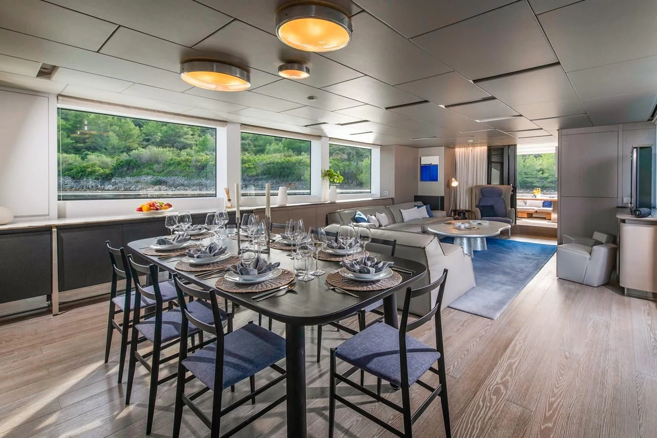 a large dining table in a kitchen aboard PARALOS Yacht for Charter