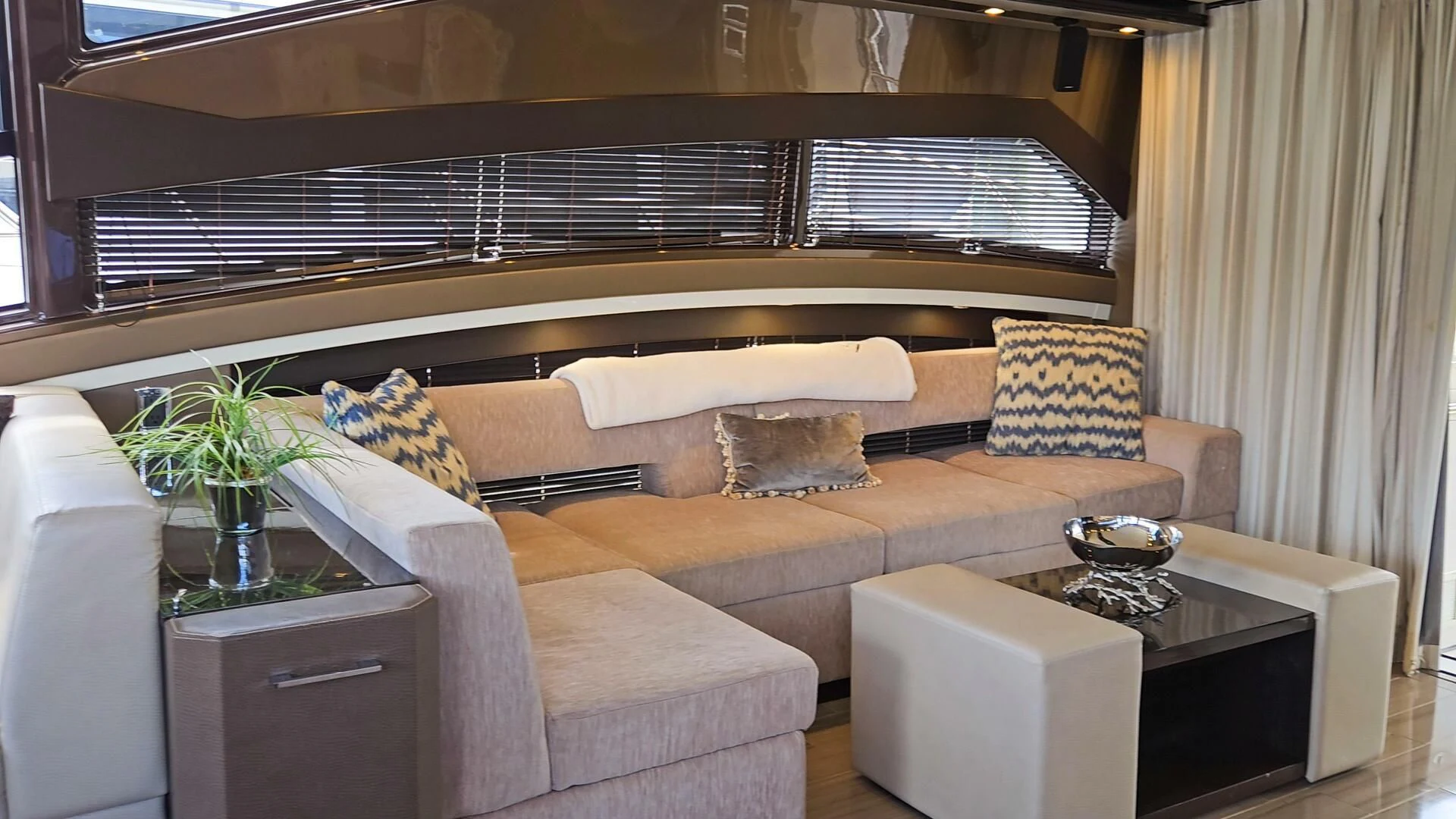 a living room with a bed and a couch aboard PARALOS Yacht for Charter
