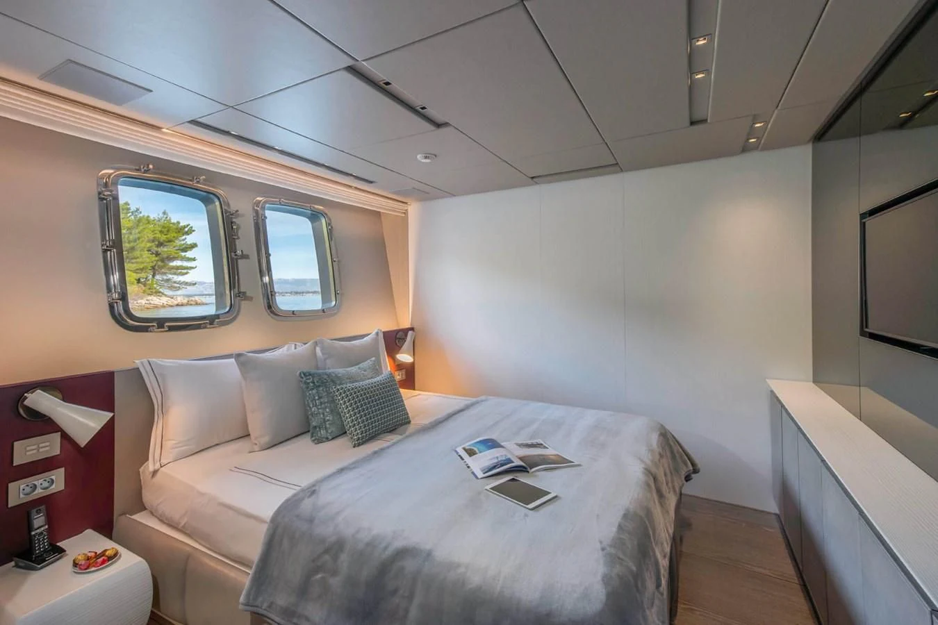 a bed in a room aboard PARALOS Yacht for Charter