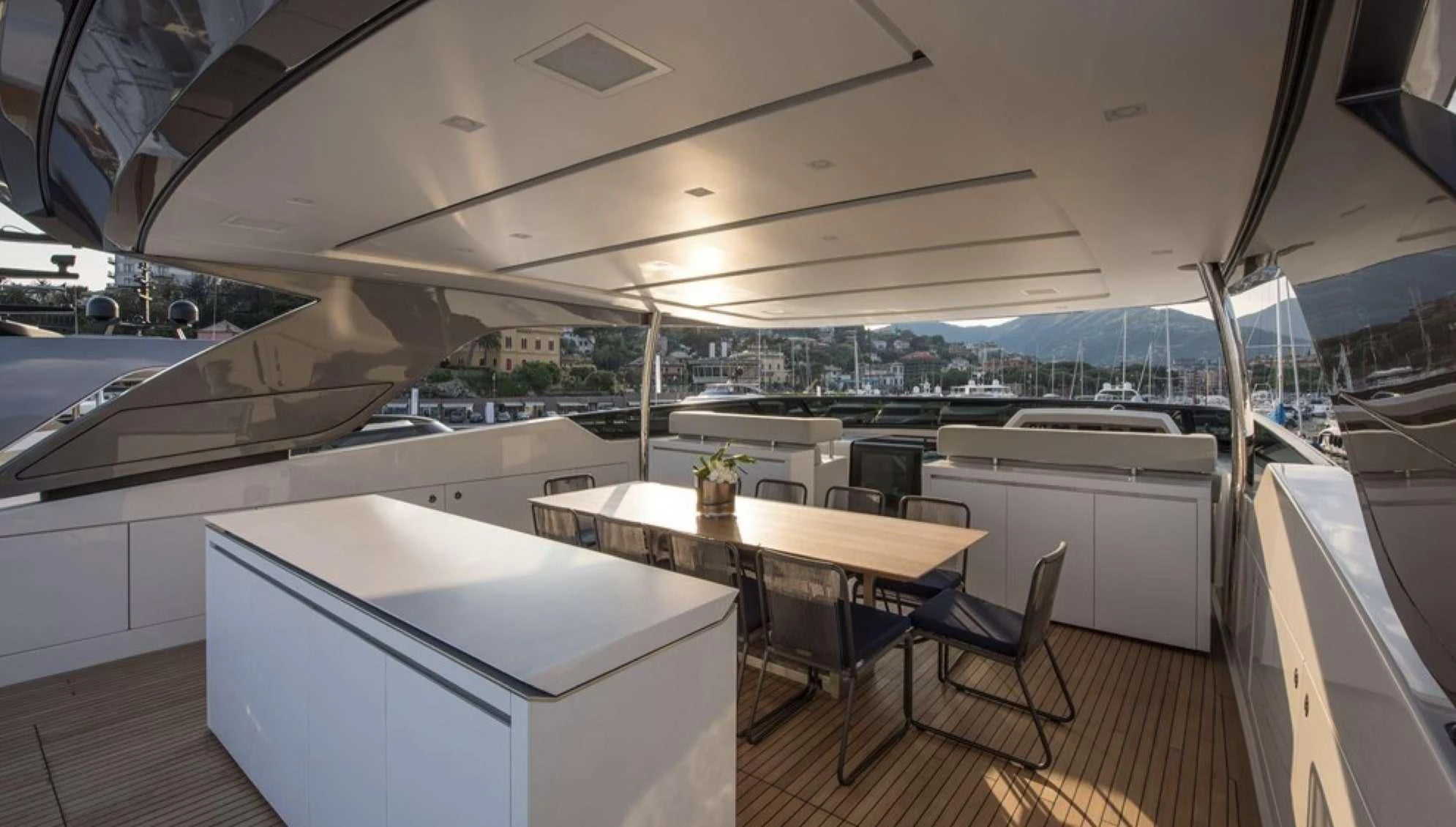 a room with a table and chairs aboard PARALOS Yacht for Charter
