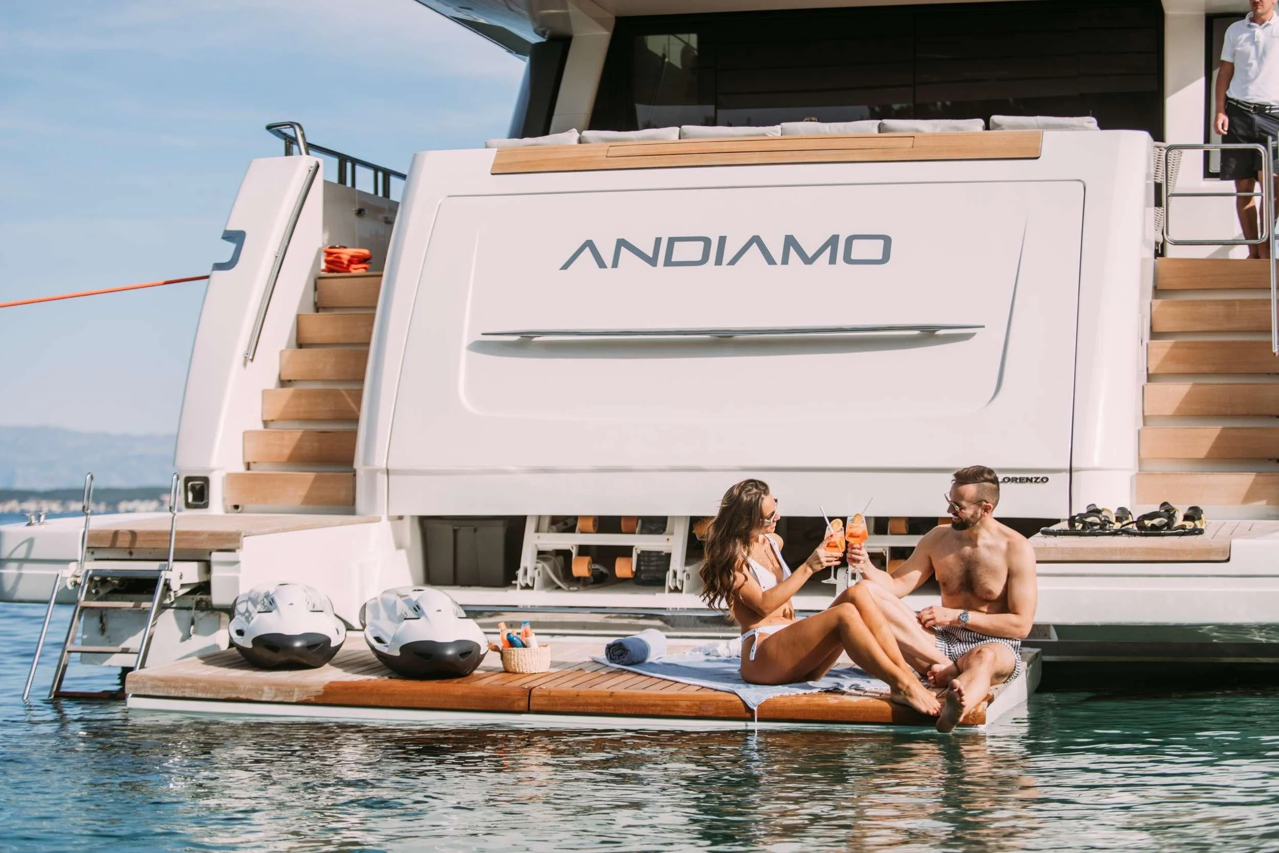 a group of people sitting on a boat in the water aboard PARALOS Yacht for Charter