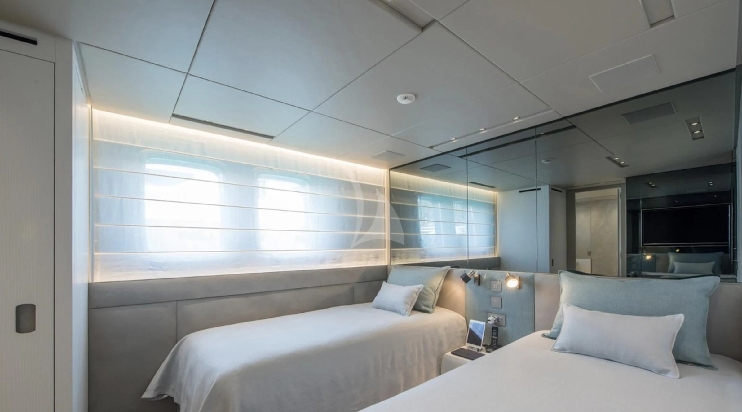 a room with two beds aboard PARALOS Yacht for Charter