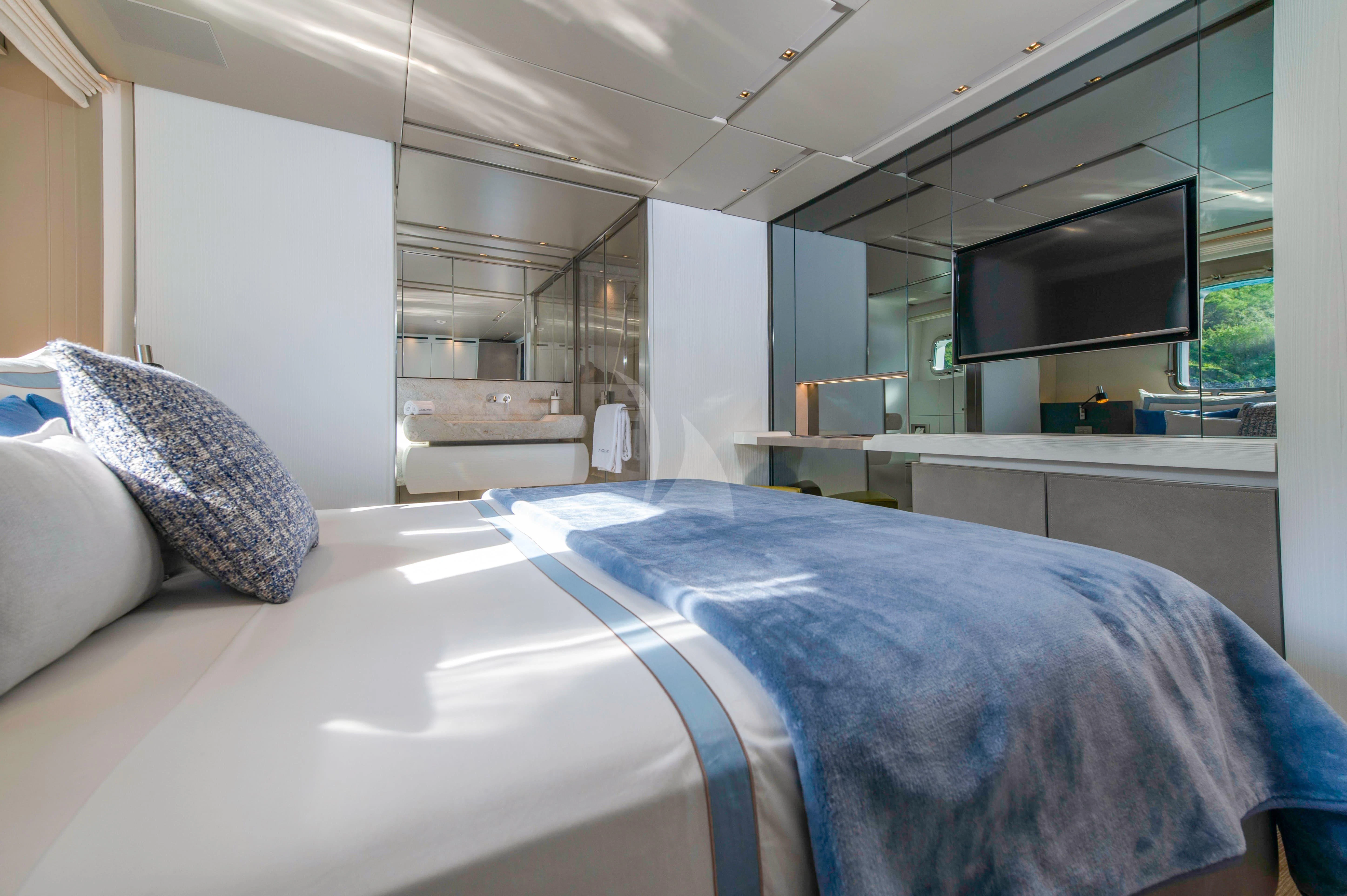a bed in a room aboard PARALOS Yacht for Charter
