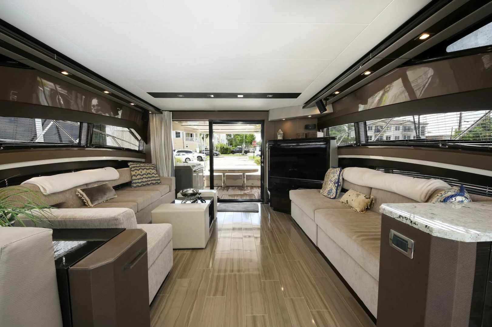 a living room with a large window aboard PARALOS Yacht for Charter