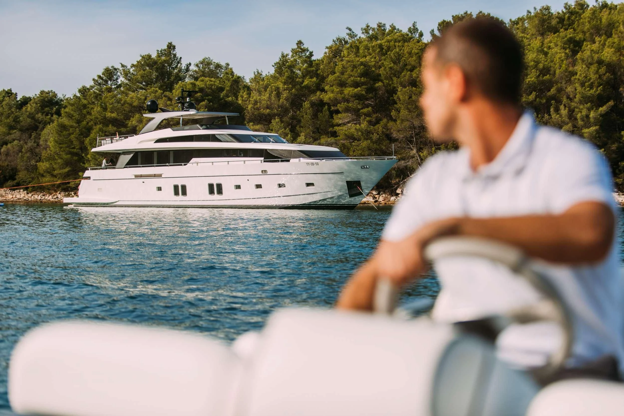 a man on a boat aboard PARALOS Yacht for Charter