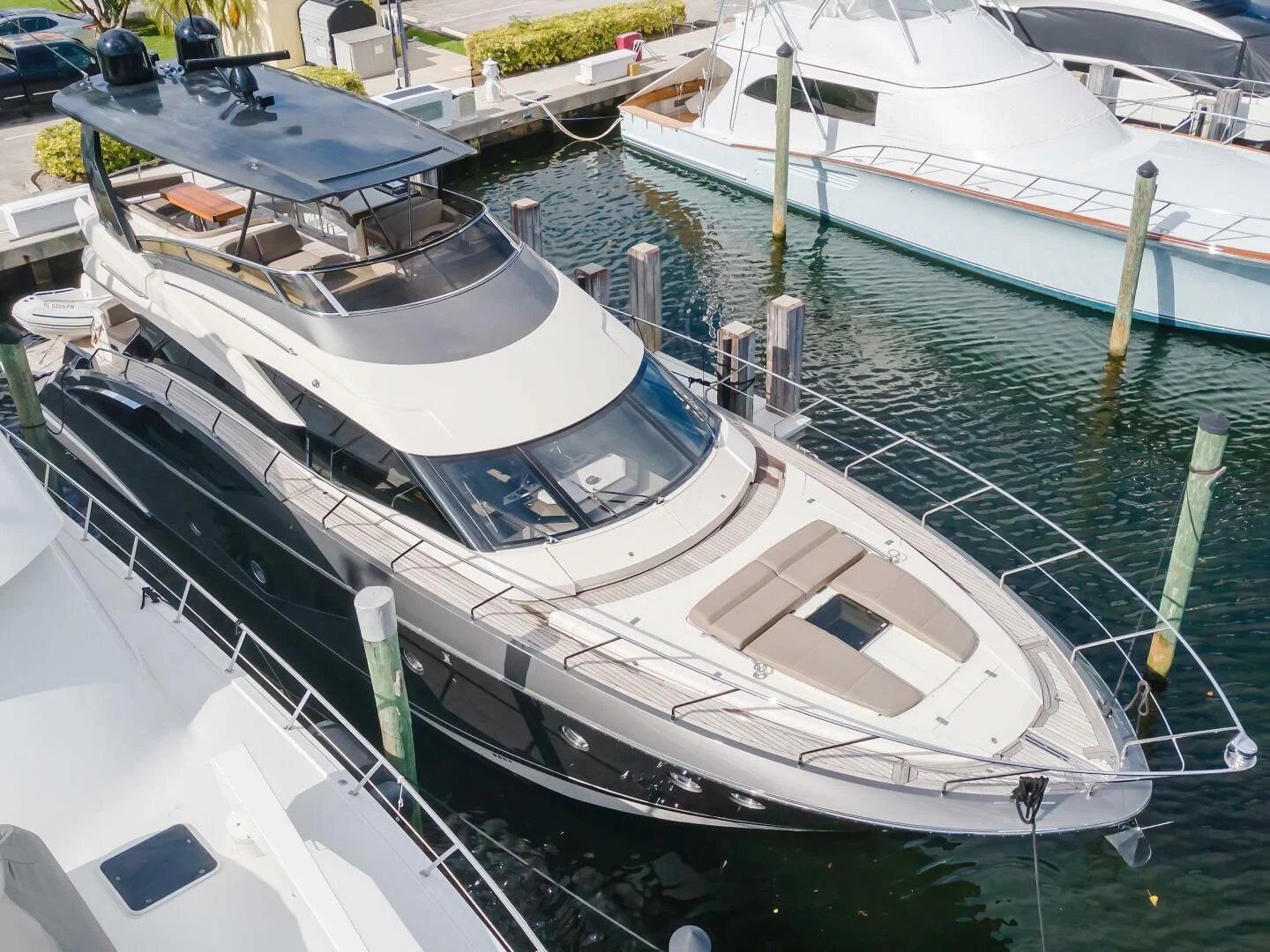 a group of boats are parked in a harbor aboard PARALOS Yacht for Charter