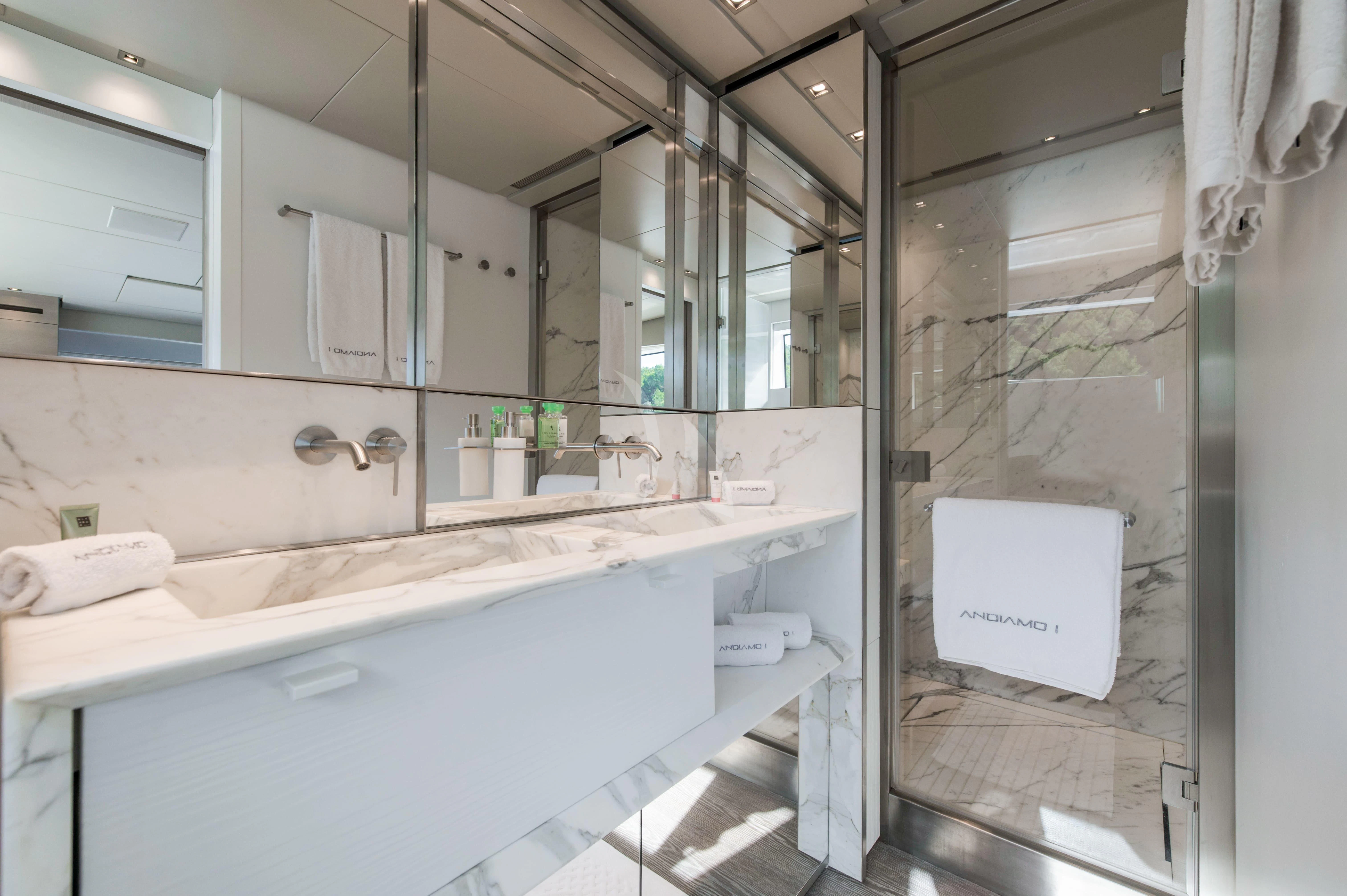 a bathroom with a large mirror aboard PARALOS Yacht for Charter