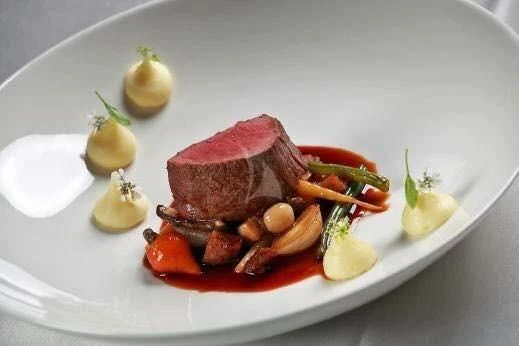 a plate of food aboard PARALOS Yacht for Charter