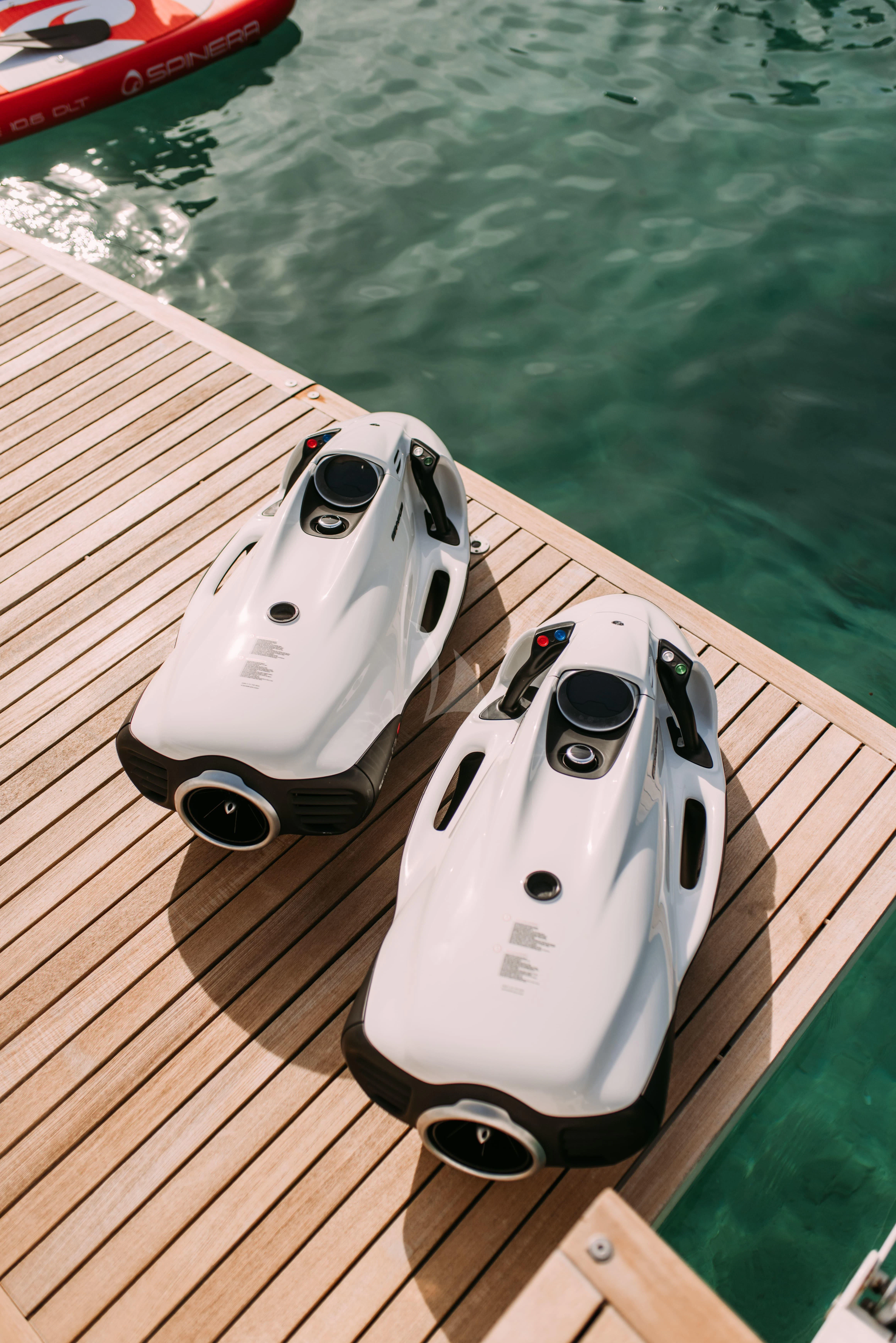 a white boat on a deck aboard PARALOS Yacht for Charter