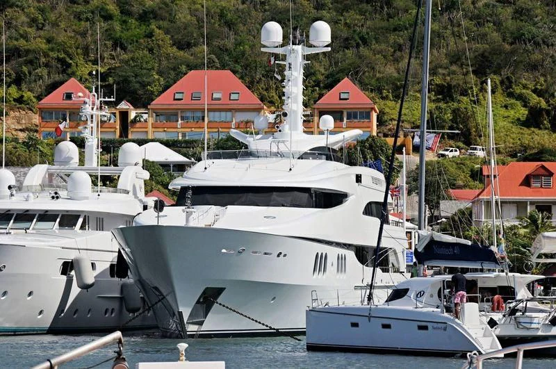 a group of boats are parked in a harbor aboard DIAMOND Yacht for Sale