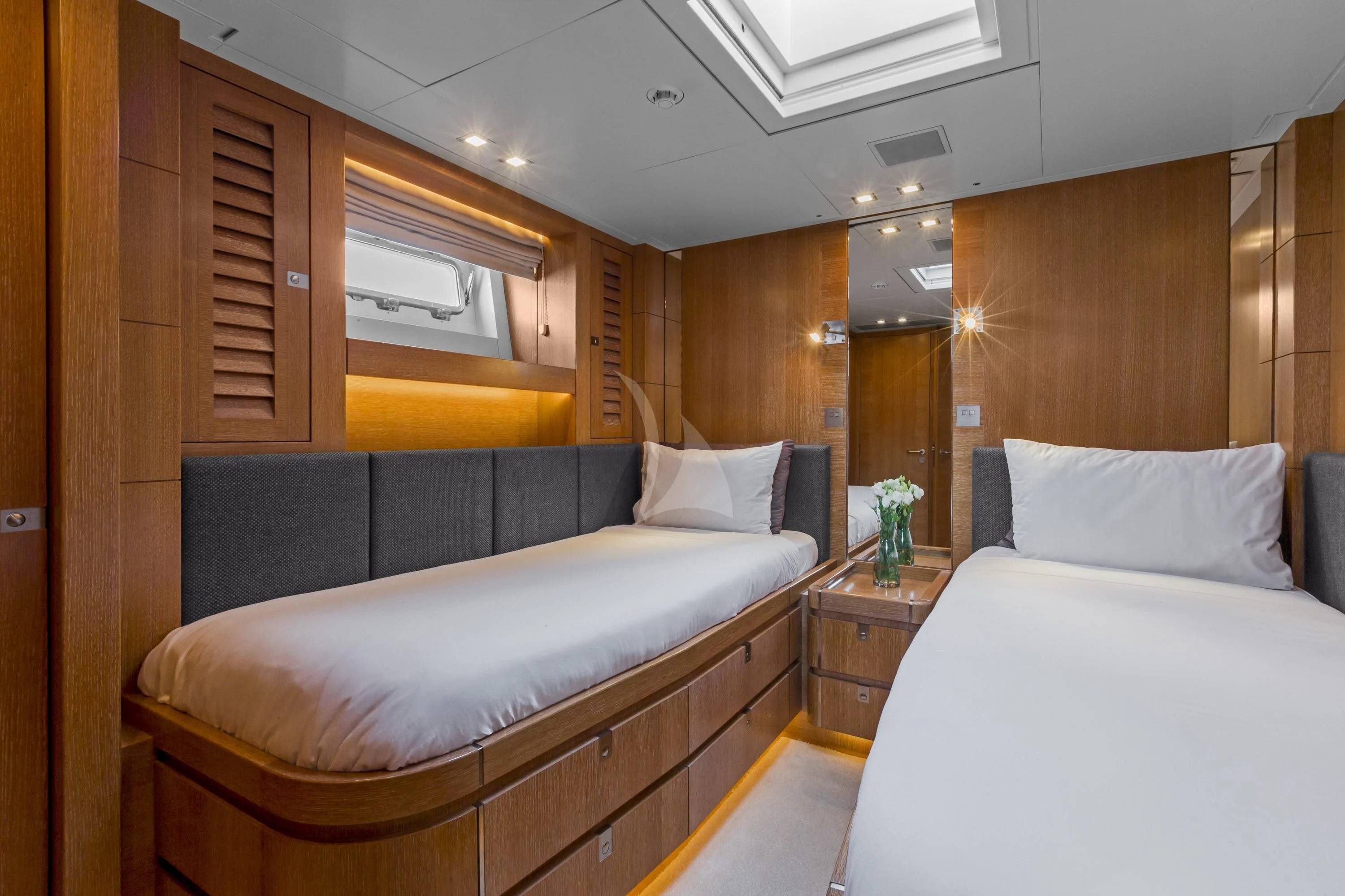 a room with two beds aboard GLISS Yacht for Sale