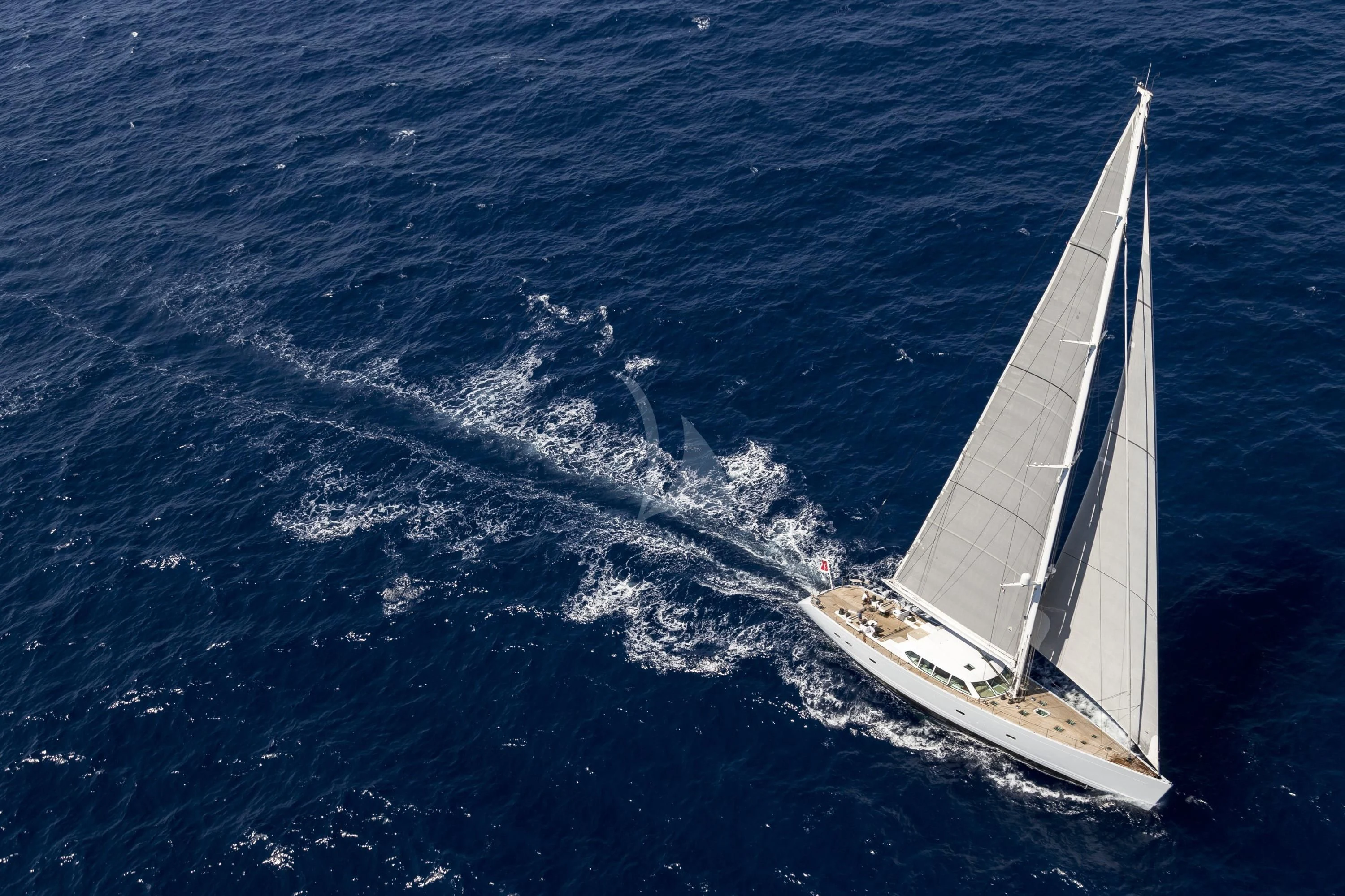 a sailboat on the water aboard GLISS Yacht for Sale
