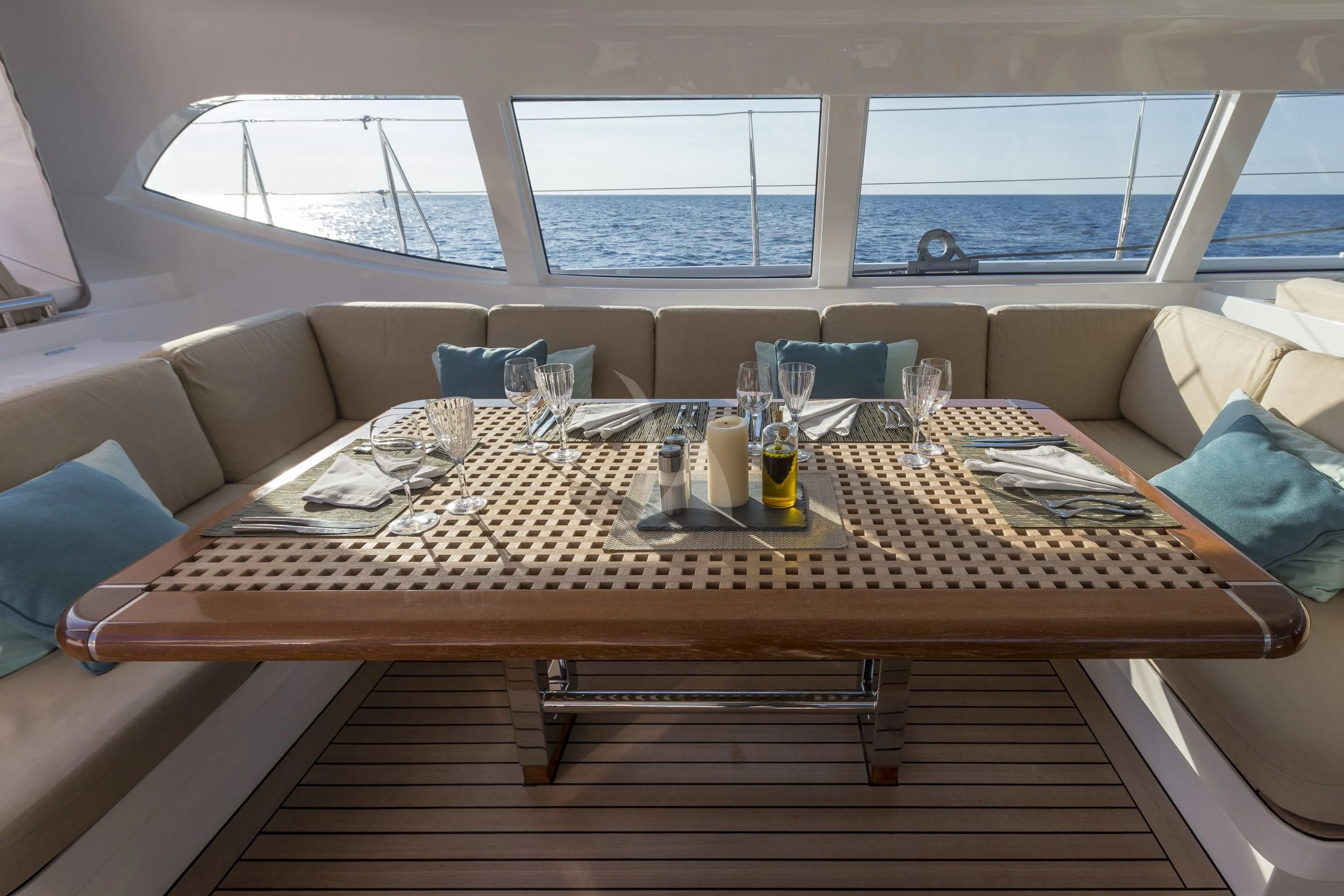 a table with glasses on it aboard GLISS Yacht for Sale