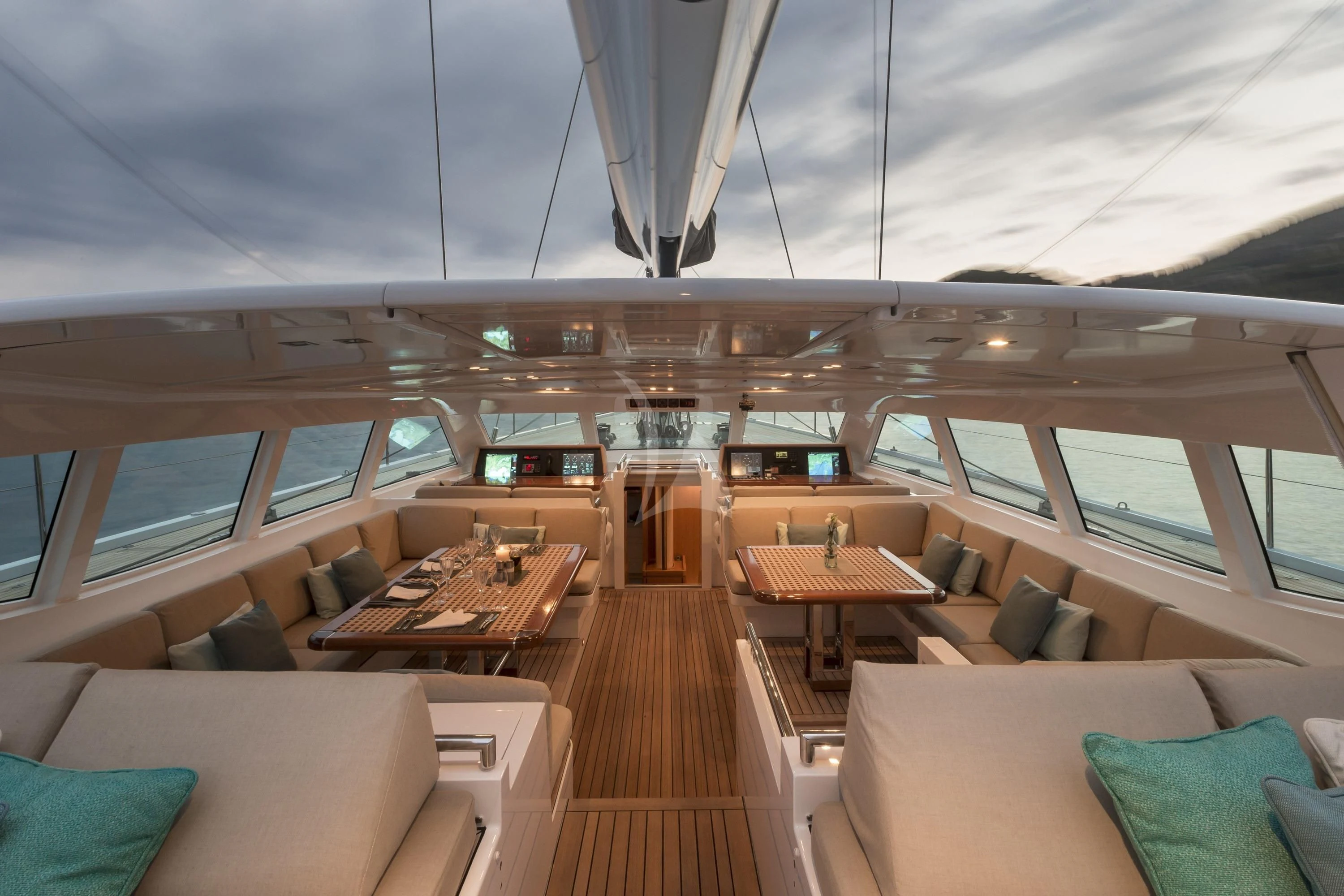 inside of a building with a table and chairs aboard GLISS Yacht for Sale