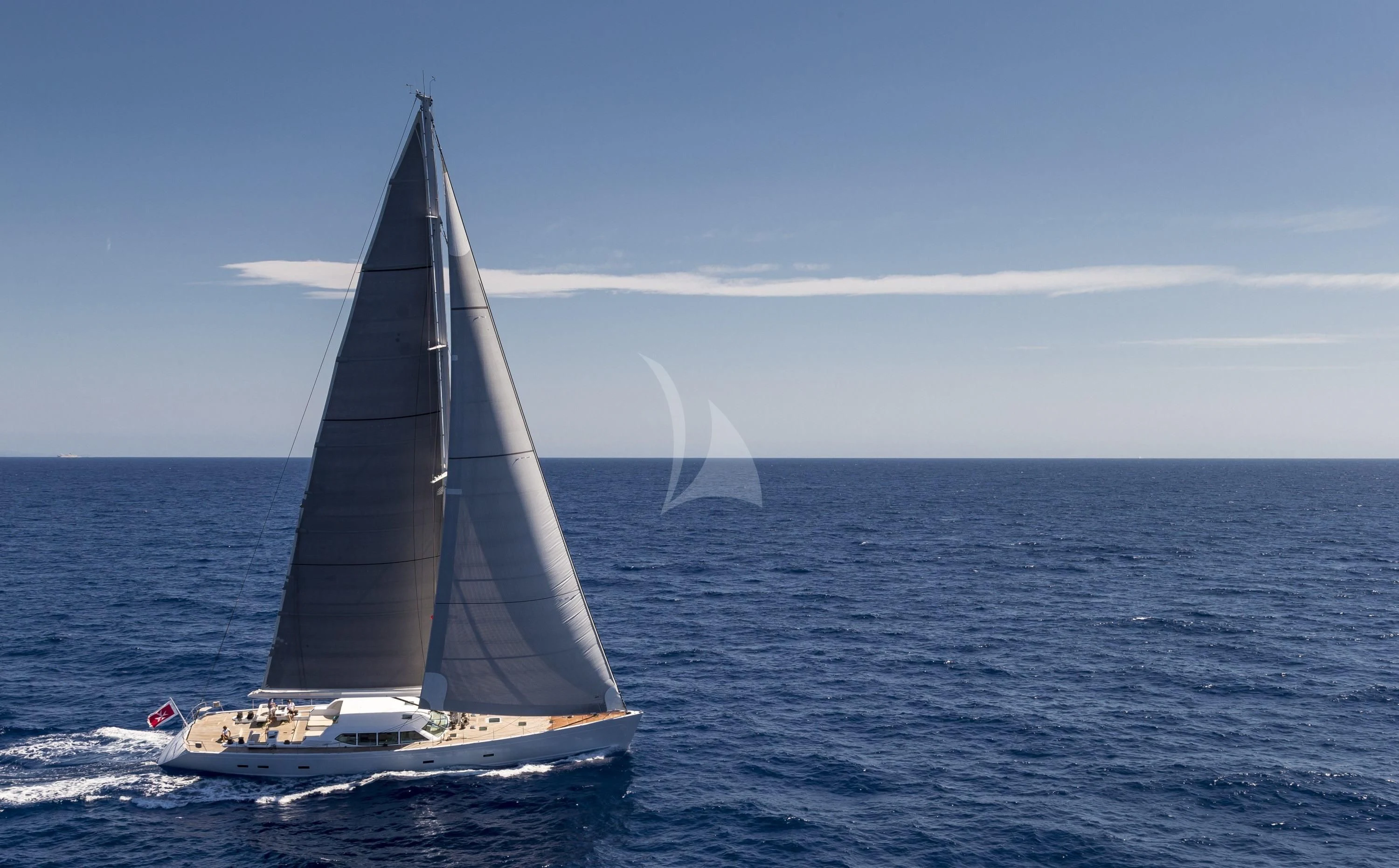 a sailboat on the water aboard GLISS Yacht for Sale