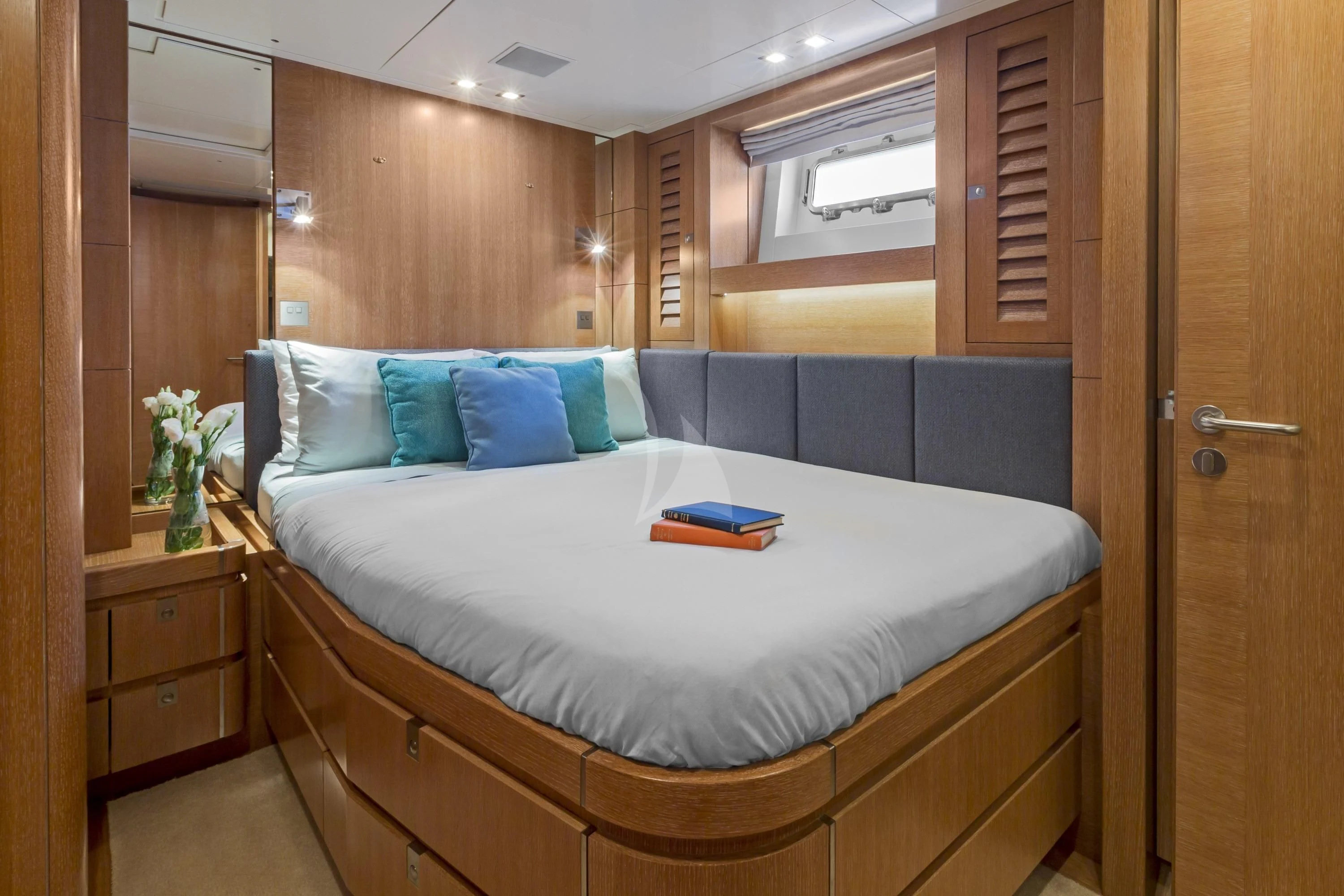 a bed in a room aboard GLISS Yacht for Sale