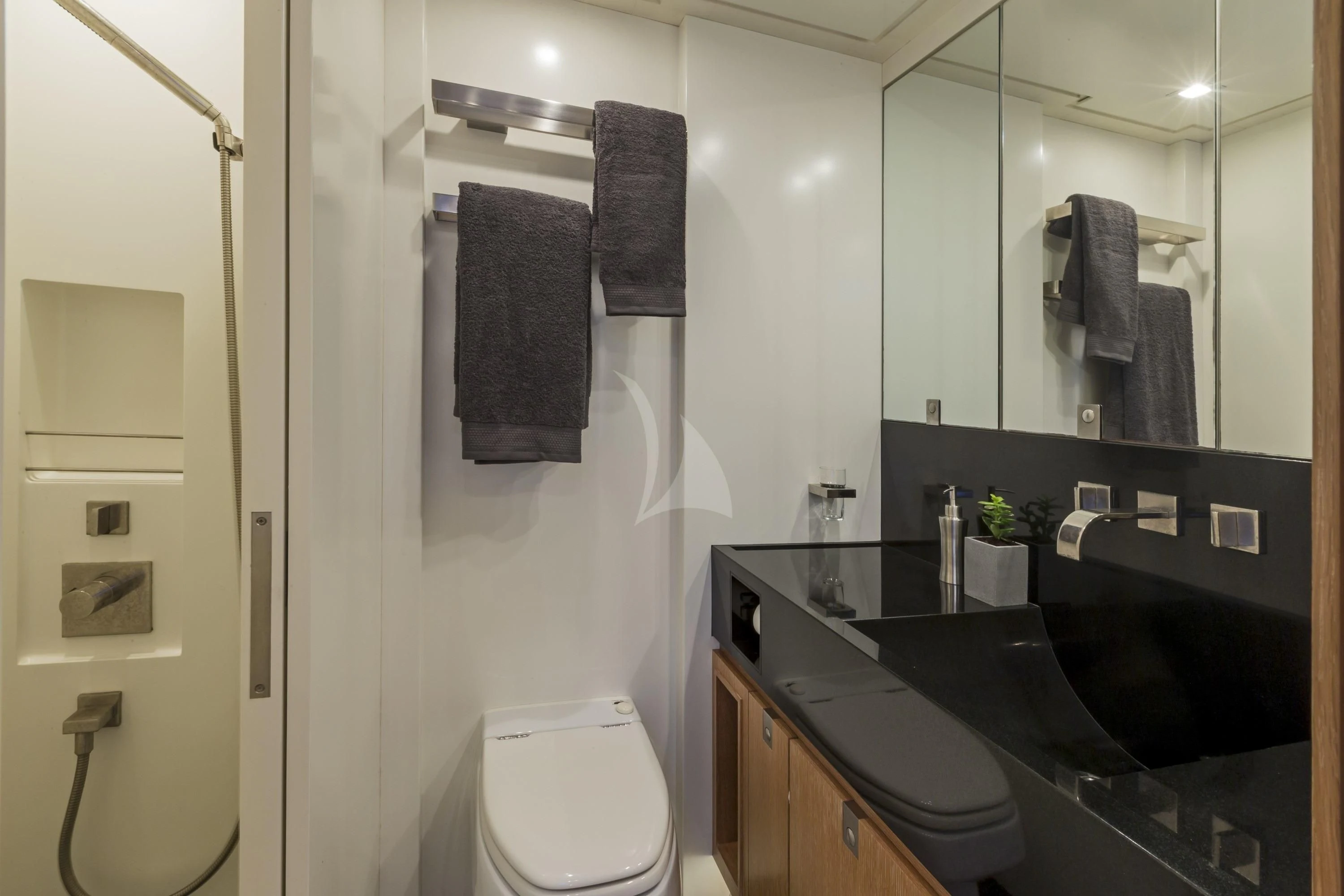 a bathroom with a sink and a toilet aboard GLISS Yacht for Sale