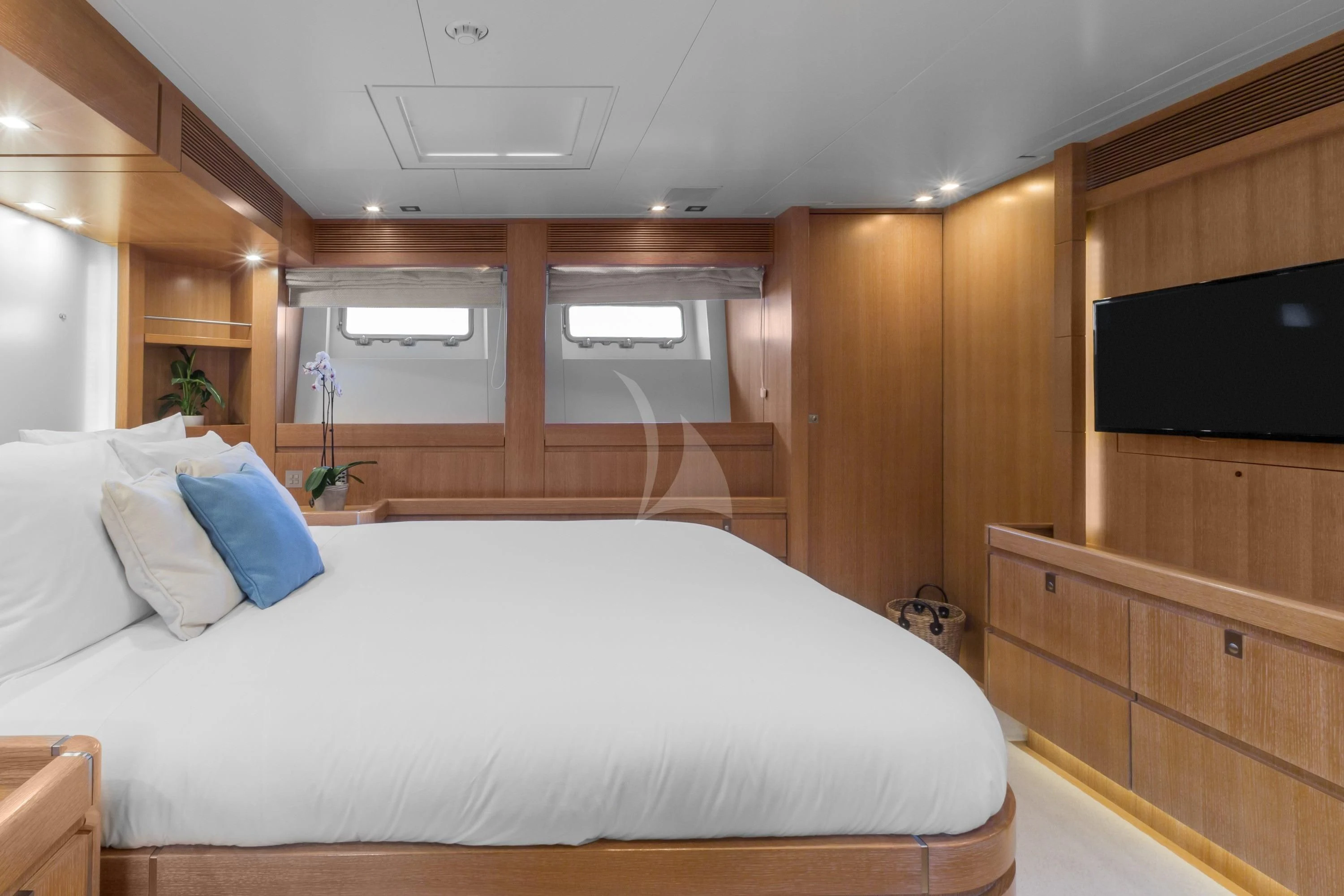 a bed in a room aboard GLISS Yacht for Sale