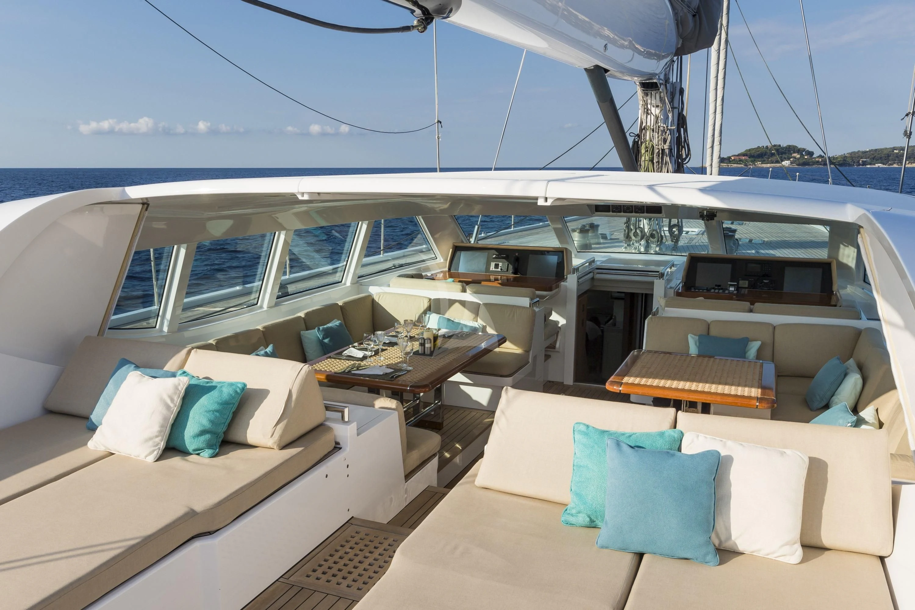 a boat with a table and chairs aboard GLISS Yacht for Sale
