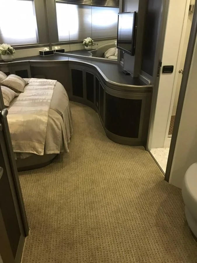 a bathroom with a large bed aboard PERSHING 90/12 Yacht for Sale