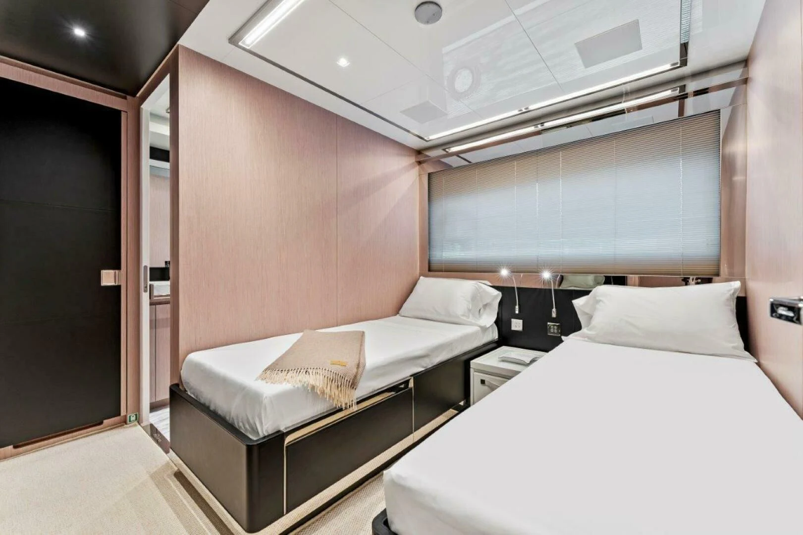 a room with two beds aboard OUR TRADE Yacht for Sale