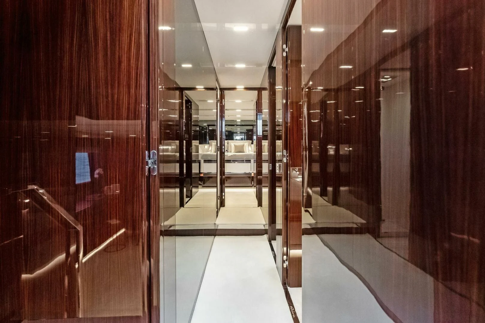 a hallway with glass doors aboard OUR TRADE Yacht for Sale