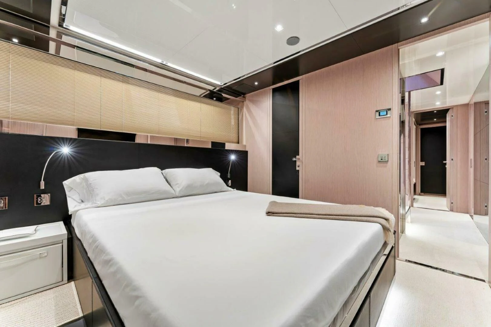 a bed in a room aboard OUR TRADE Yacht for Sale