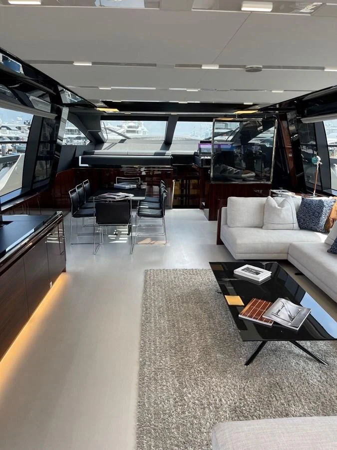 a room with a couch and a table aboard OUR TRADE Yacht for Sale