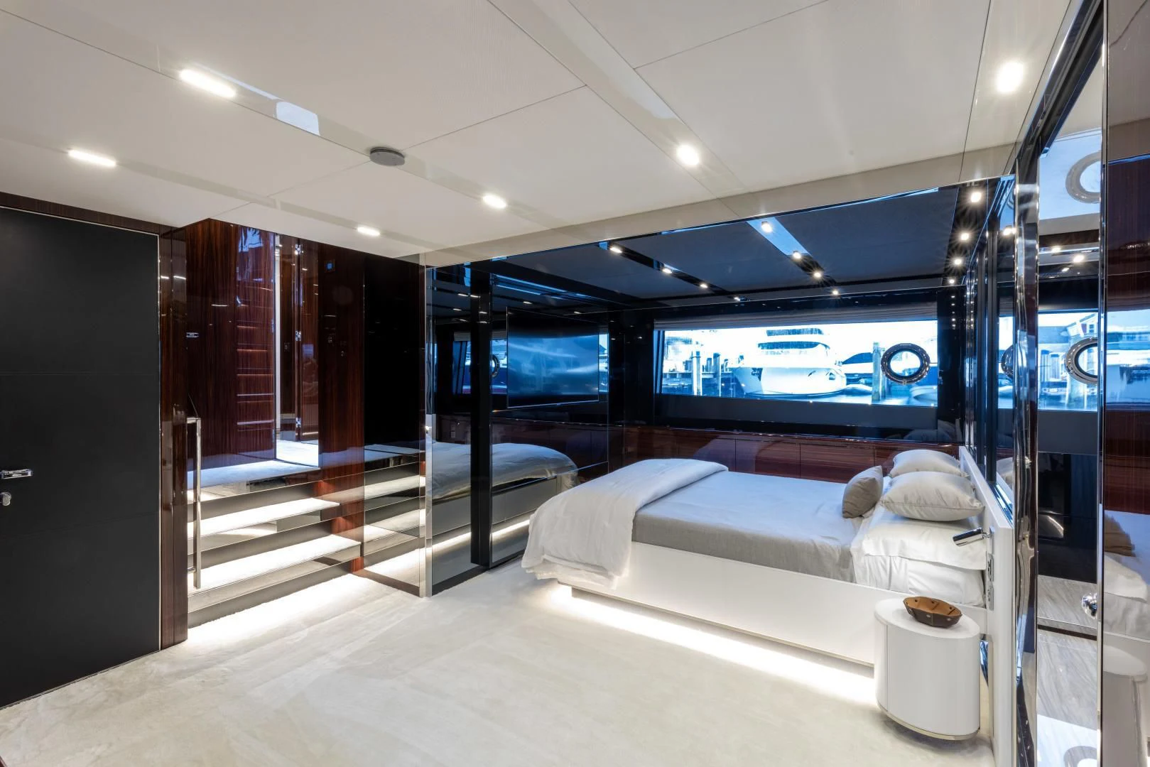 a room with a bed and a screen aboard OUR TRADE Yacht for Sale