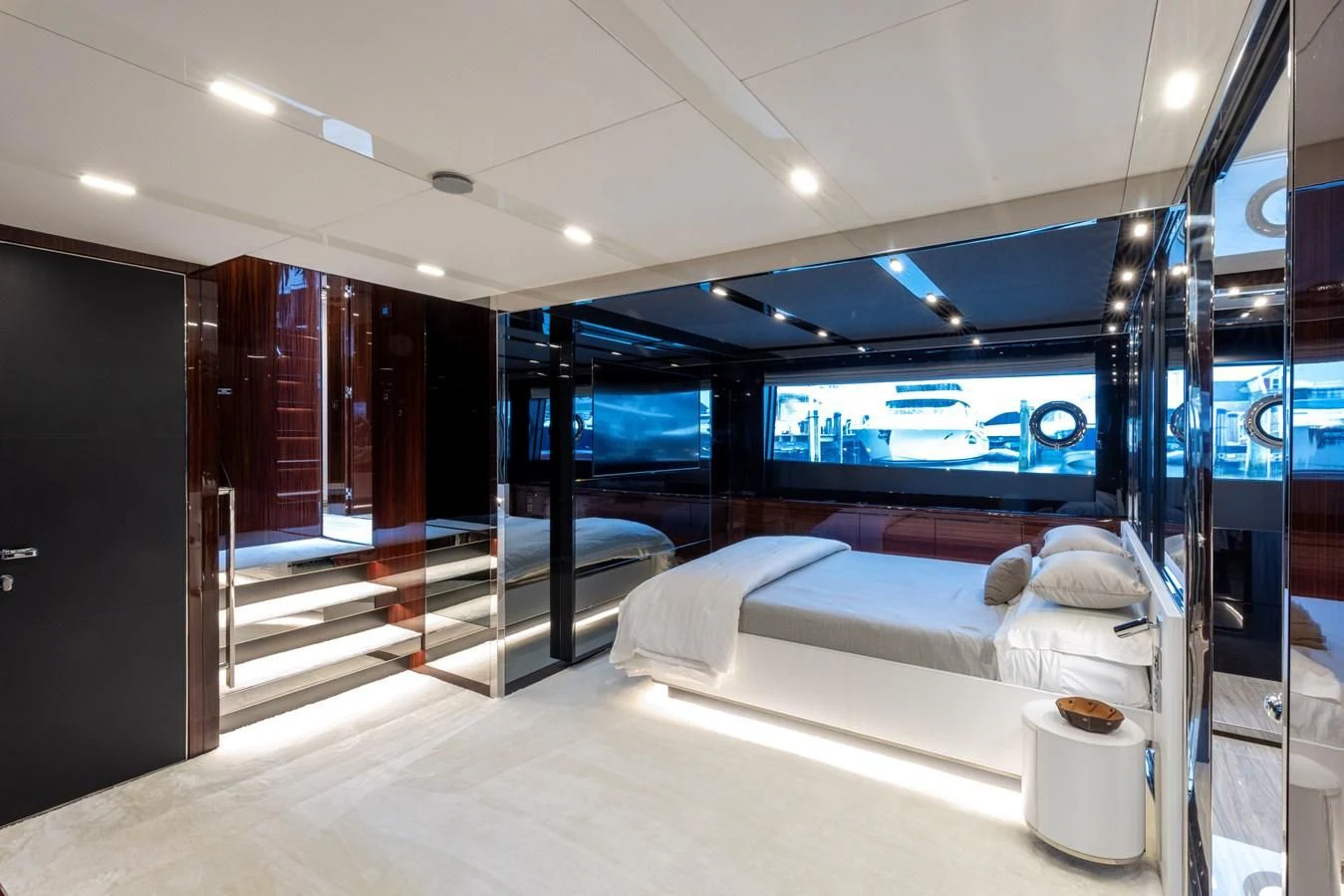 a room with a bed and a tv aboard OUR TRADE Yacht for Sale