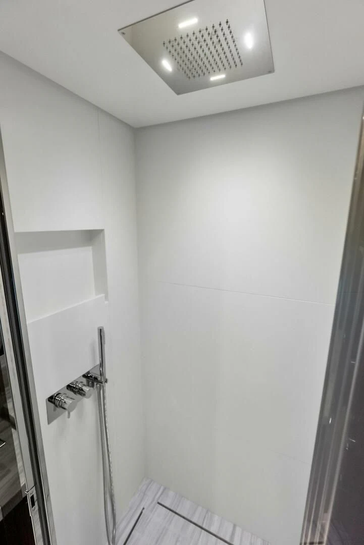 a room with a light fixture aboard OUR TRADE Yacht for Sale