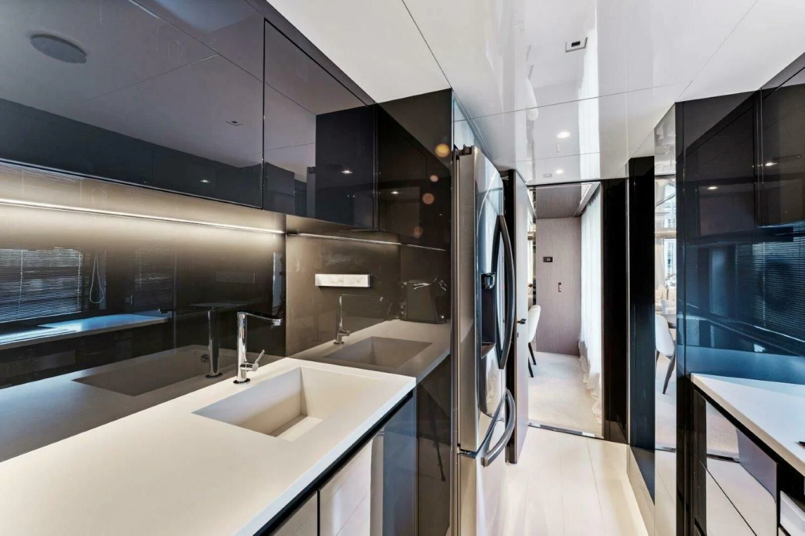 a modern bathroom with a large sink aboard OUR TRADE Yacht for Sale