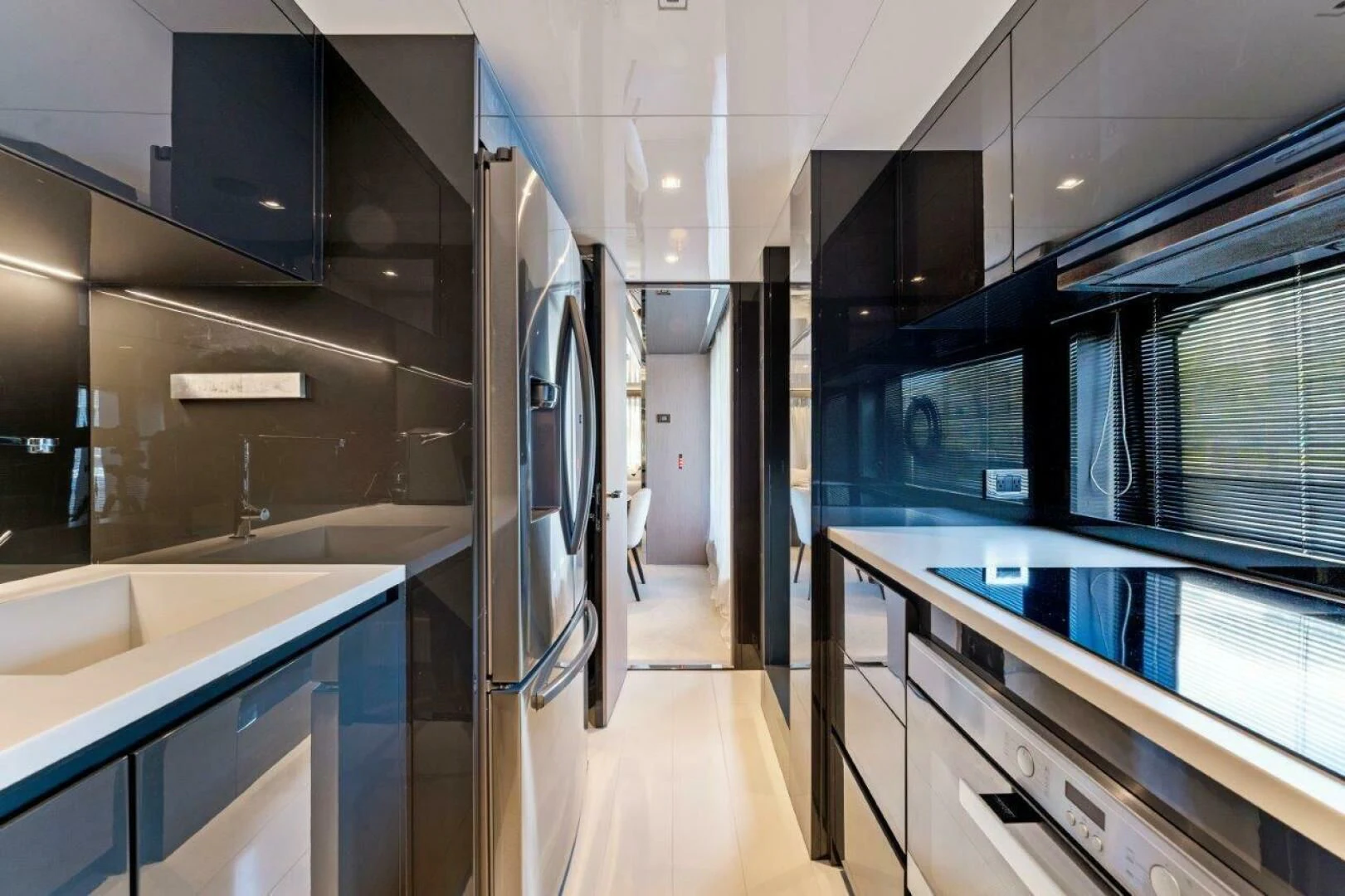 a room with a large counter and cabinets aboard OUR TRADE Yacht for Sale
