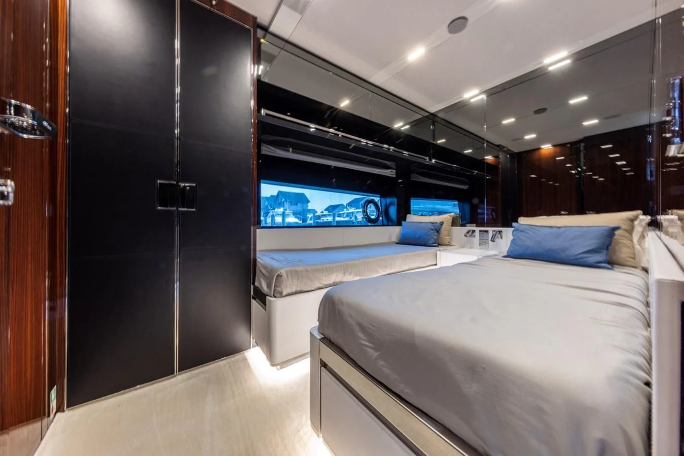 a room with a bed and a tv aboard OUR TRADE Yacht for Sale