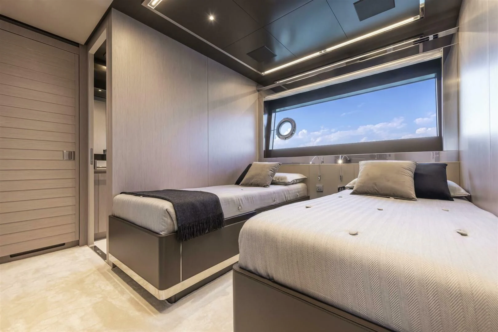 a room with two beds aboard OUR TRADE Yacht for Sale