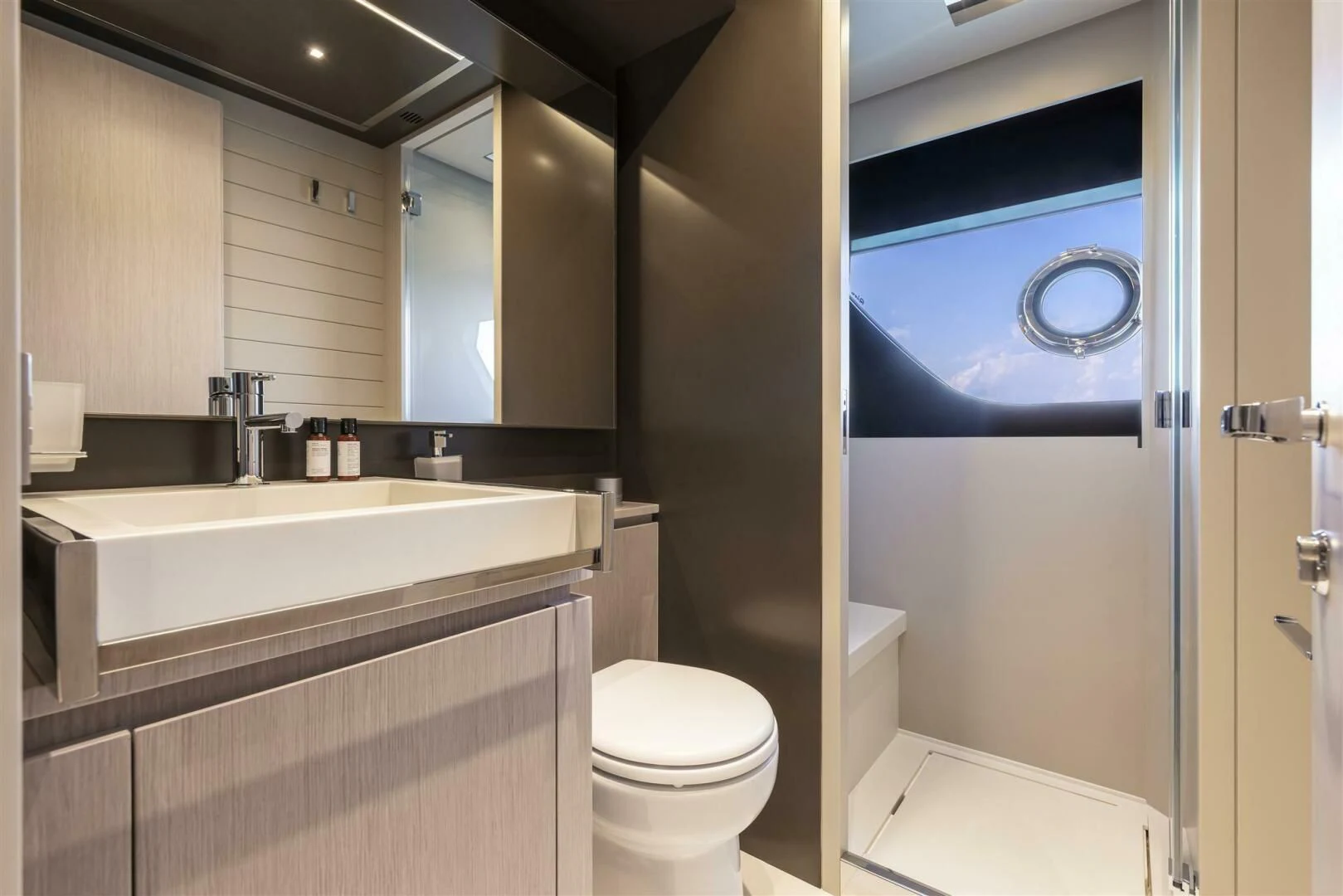 a bathroom with a sink and a toilet aboard OUR TRADE Yacht for Sale