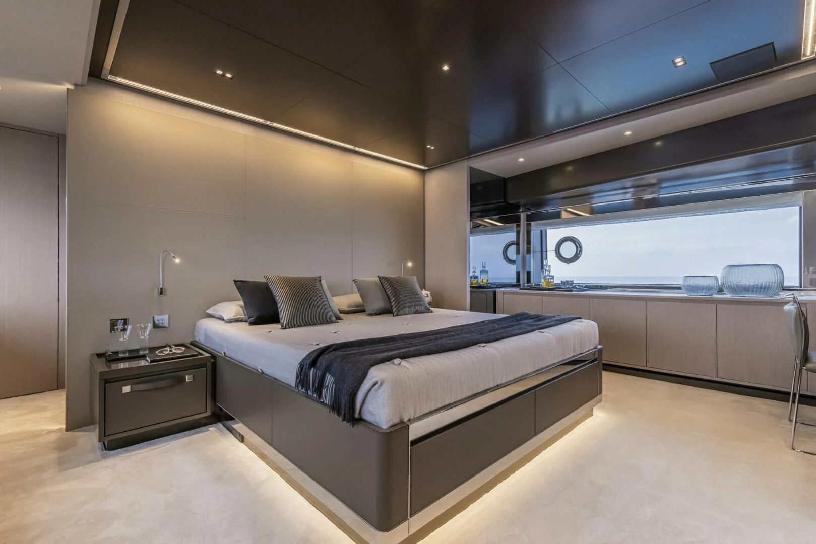 a room with a bed and a desk aboard OUR TRADE Yacht for Sale