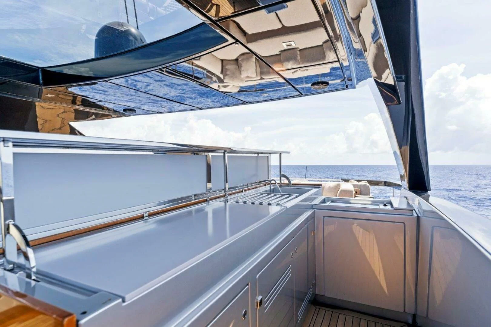 a boat with a large white sail aboard OUR TRADE Yacht for Sale