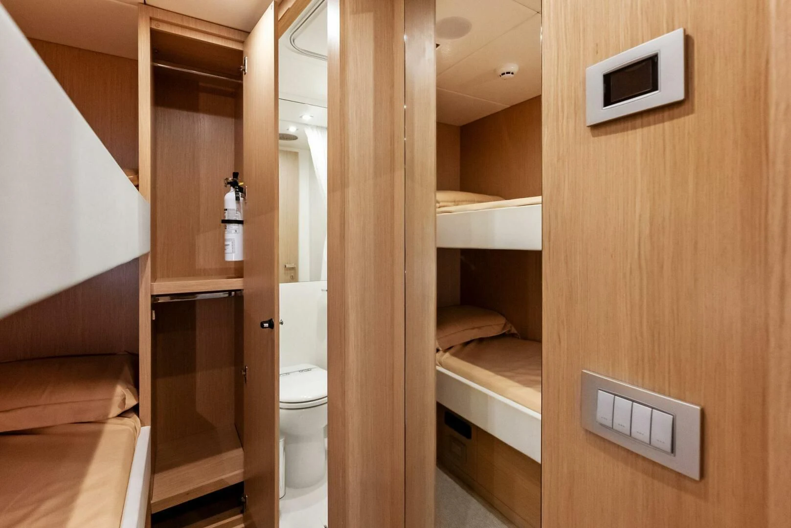 a bathroom with a toilet and a sink aboard OUR TRADE Yacht for Sale
