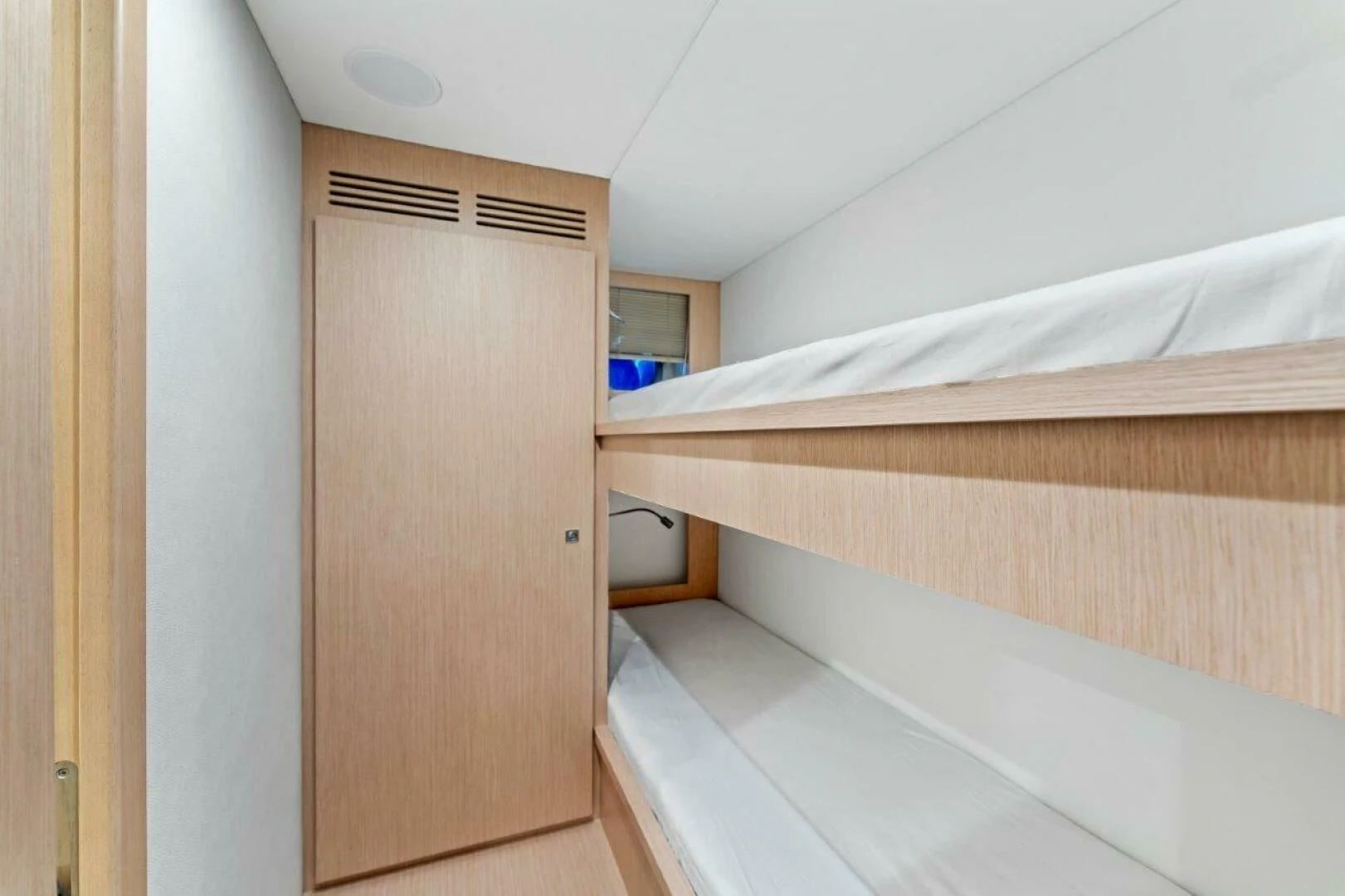 a room with bunk beds aboard OUR TRADE Yacht for Sale