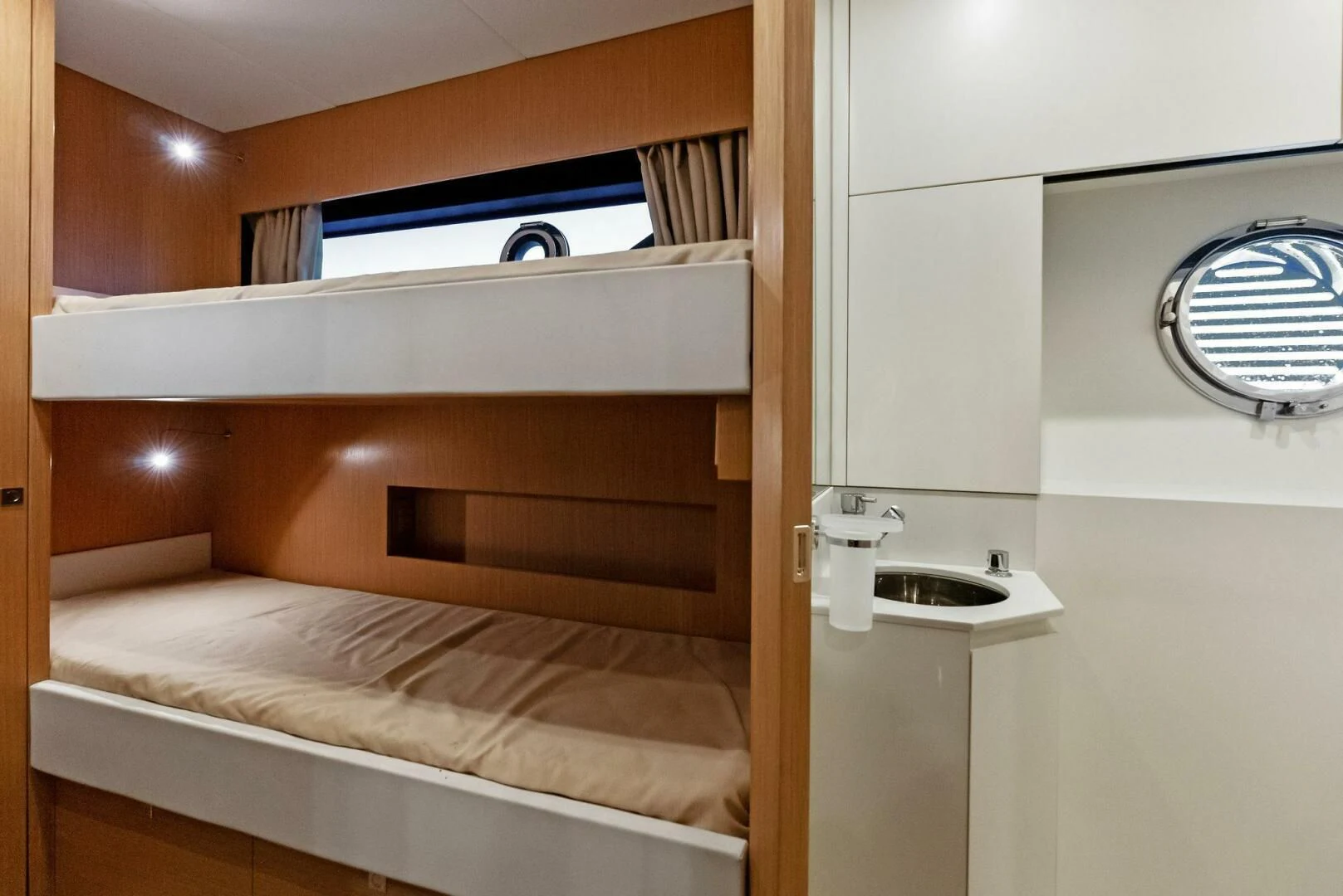 a room with a bed and a mirror aboard OUR TRADE Yacht for Sale