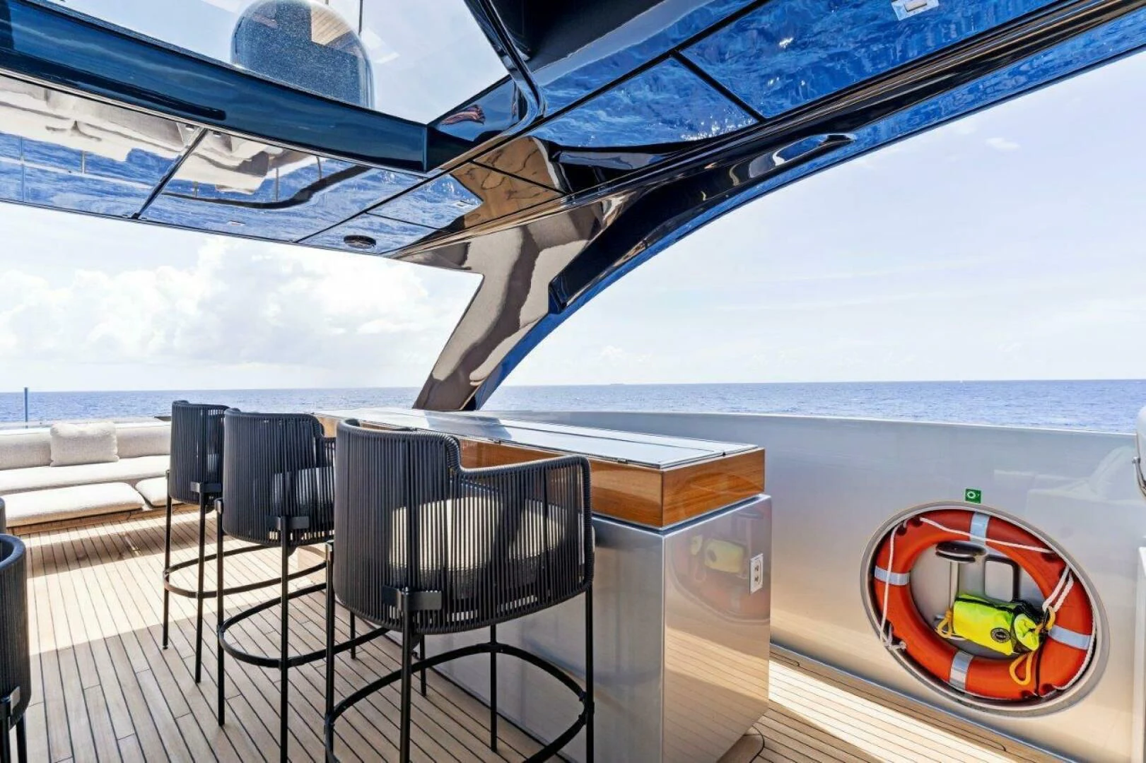 a table and chairs on a boat aboard OUR TRADE Yacht for Sale