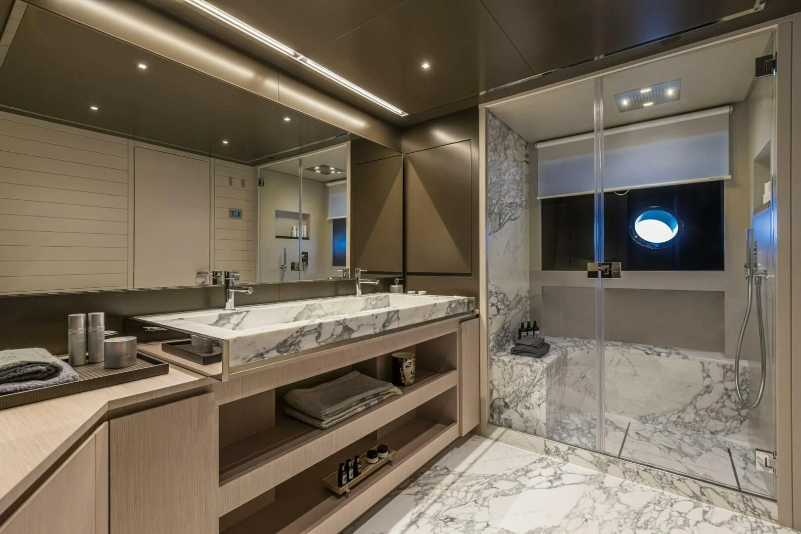 a bathroom with a large mirror aboard OUR TRADE Yacht for Sale