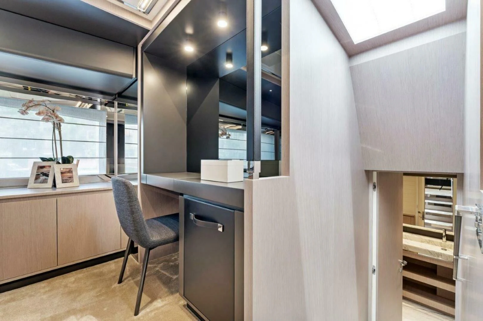 a room with a chair and a desk aboard OUR TRADE Yacht for Sale