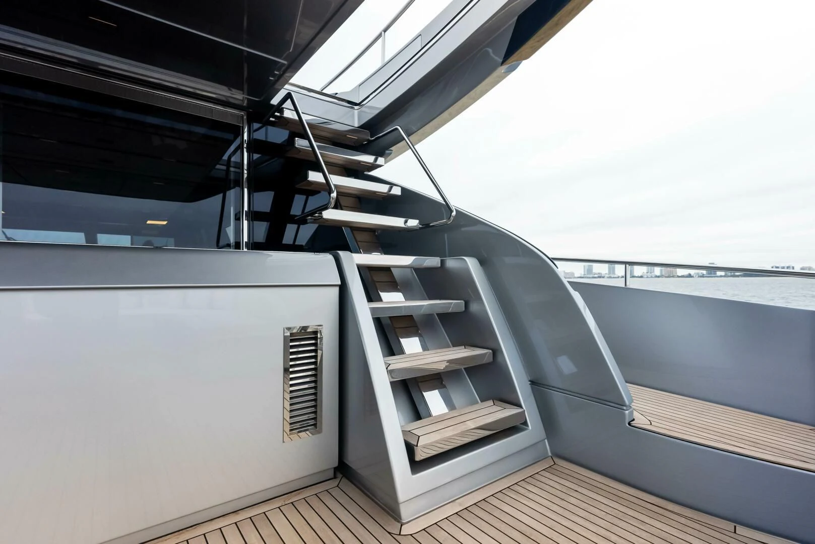 a large white boat on a deck aboard OUR TRADE Yacht for Sale