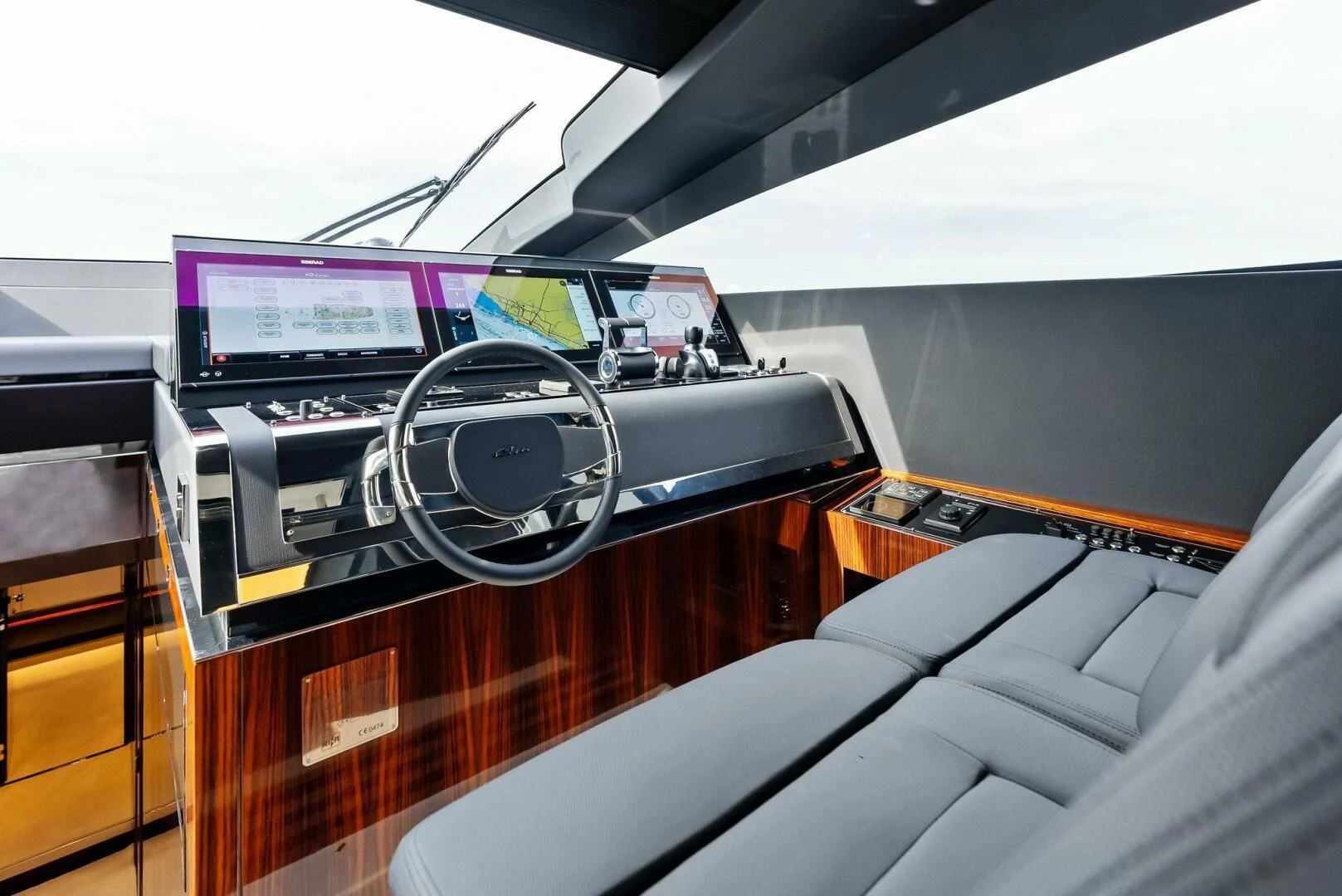 a car with a screen aboard OUR TRADE Yacht for Sale