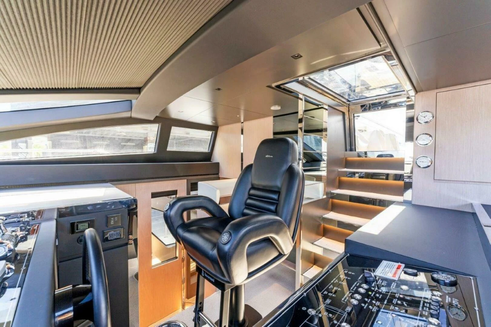 a room with a table and chairs aboard OUR TRADE Yacht for Sale