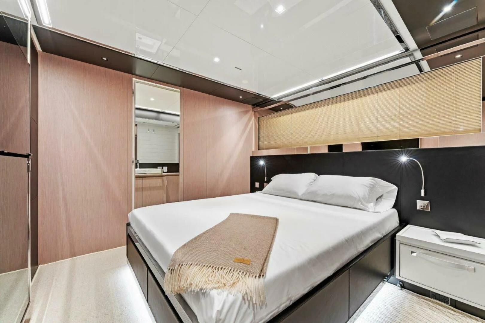a room with a bed and a desk aboard OUR TRADE Yacht for Sale