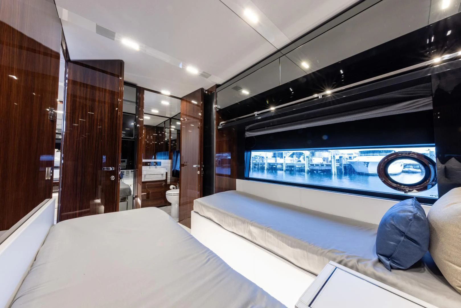 a room with a bed and a screen aboard OUR TRADE Yacht for Sale
